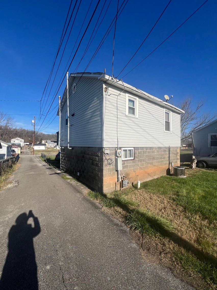 Image for SOLD $73,700 - Home and Income Generating Apartment Selling to the Highest Bidder