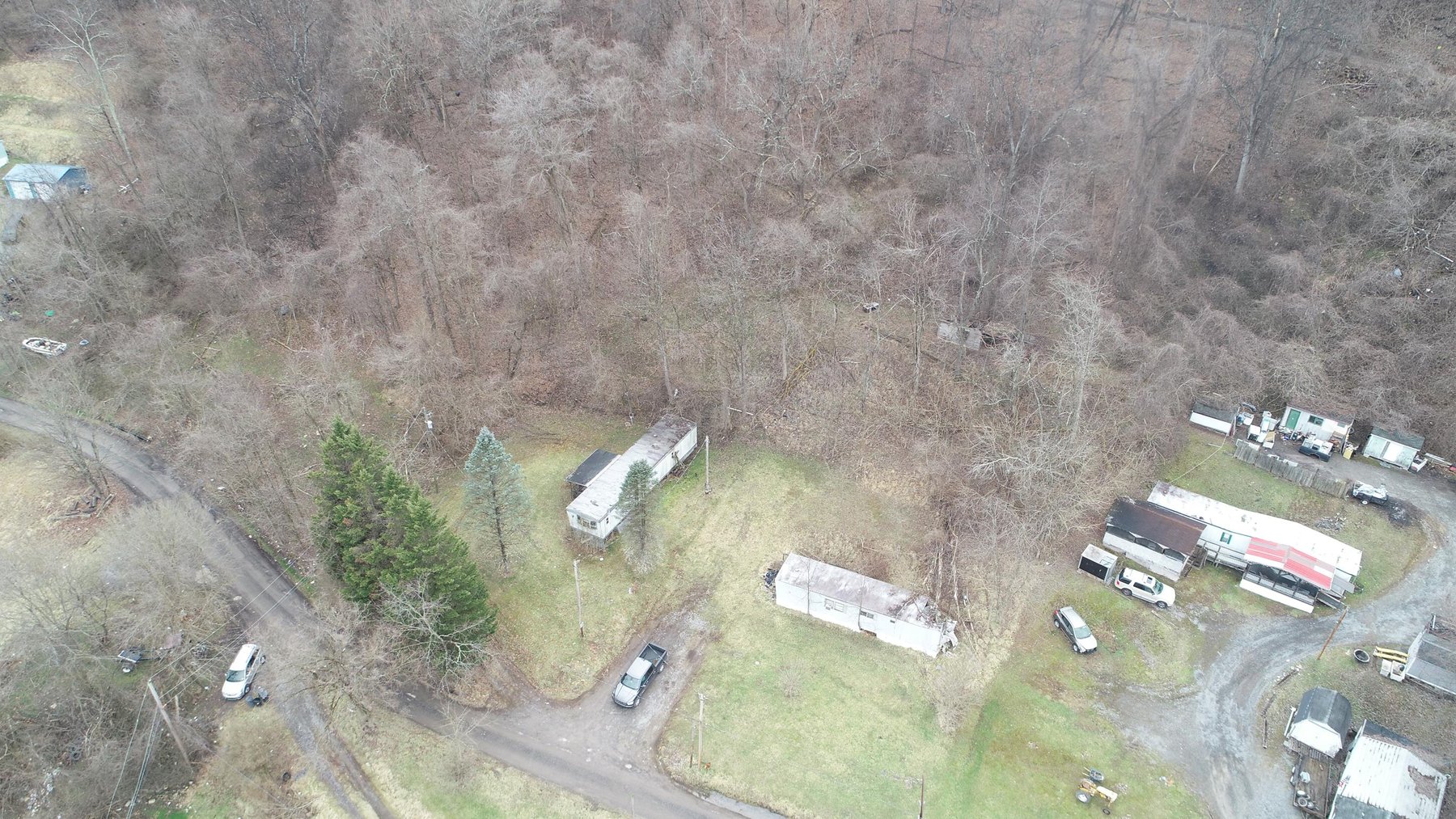Image for SOLD $61,600 - 1.71 Acres with 4 Mobile Home Spots in Morgantown Selling to the Highest Bidder