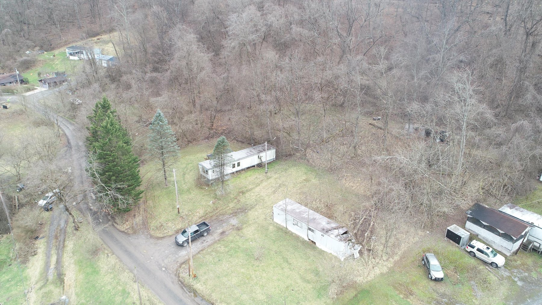 Image for SOLD $61,600 - 1.71 Acres with 4 Mobile Home Spots in Morgantown Selling to the Highest Bidder