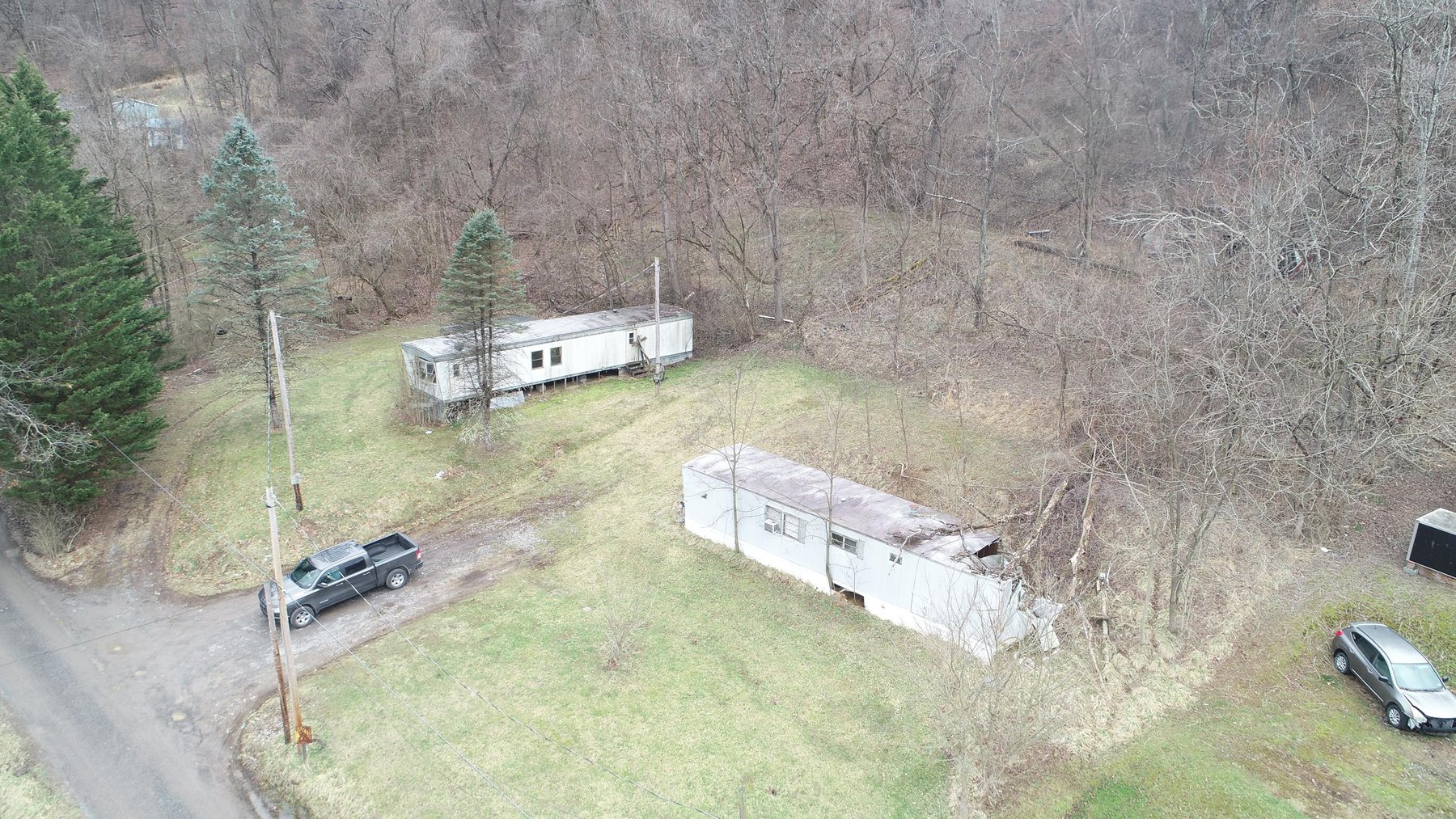 Image for SOLD $61,600 - 1.71 Acres with 4 Mobile Home Spots in Morgantown Selling to the Highest Bidder