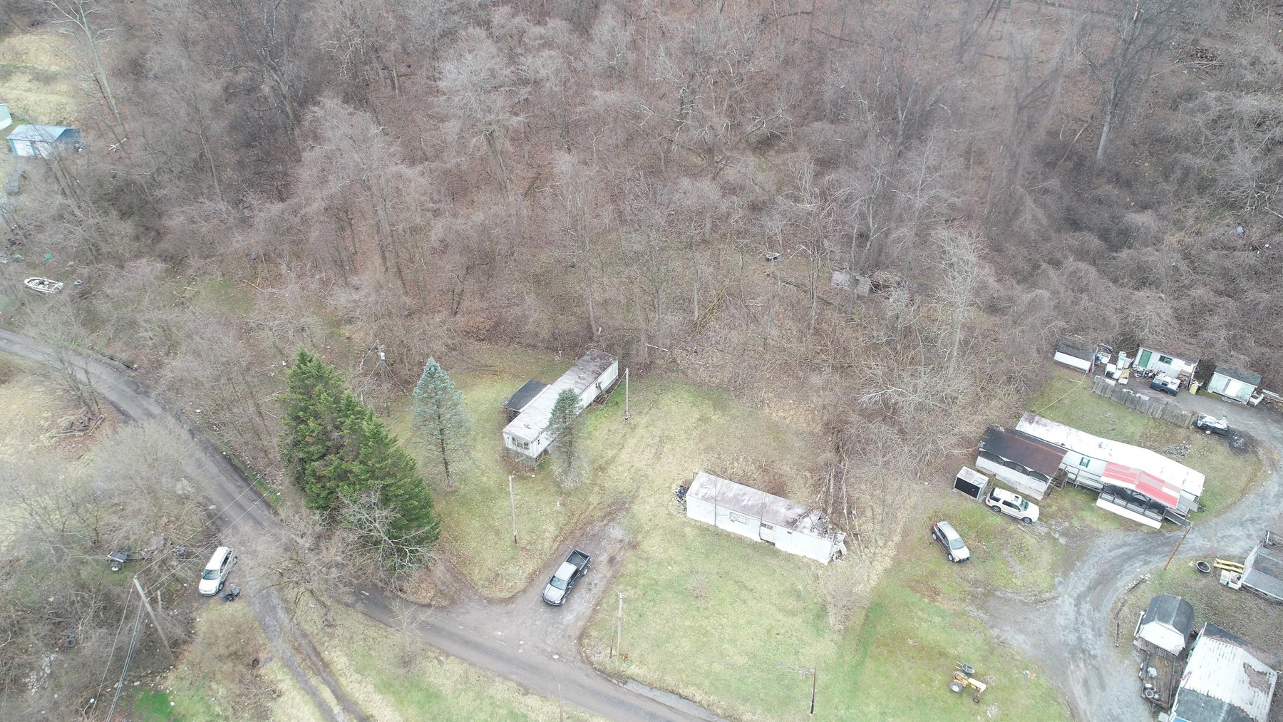 Image for SOLD $61,600 - 1.71 Acres with 4 Mobile Home Spots in Morgantown Selling to the Highest Bidder