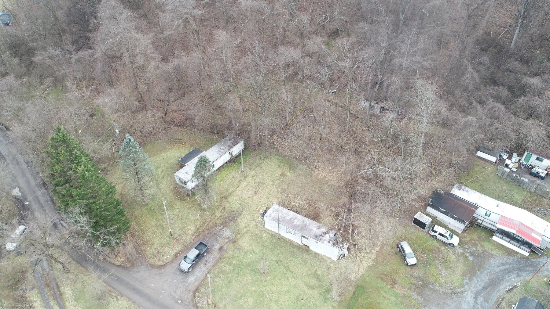 Image for SOLD $61,600 - 1.71 Acres with 4 Mobile Home Spots in Morgantown Selling to the Highest Bidder