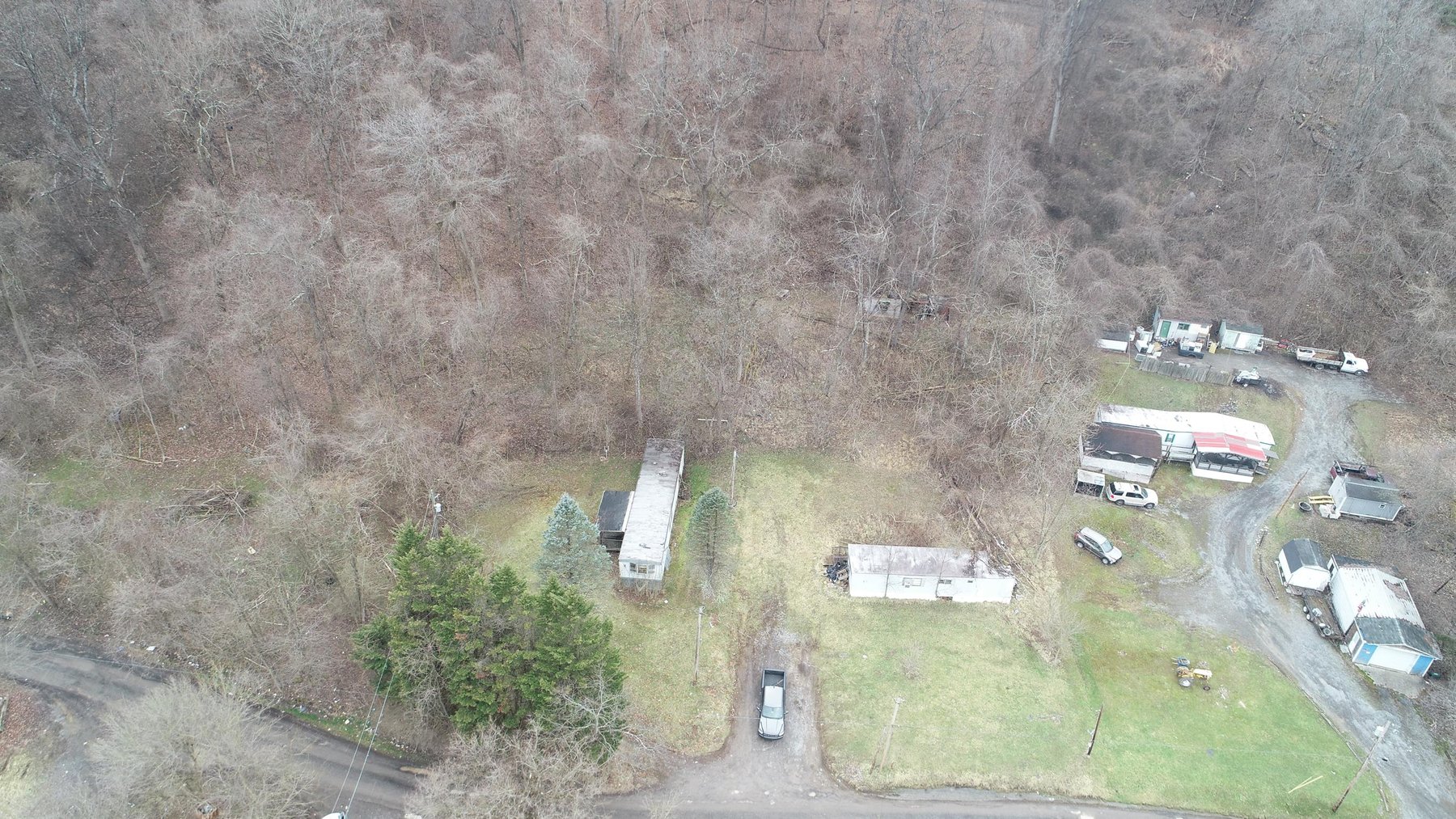 Image for SOLD $61,600 - 1.71 Acres with 4 Mobile Home Spots in Morgantown Selling to the Highest Bidder