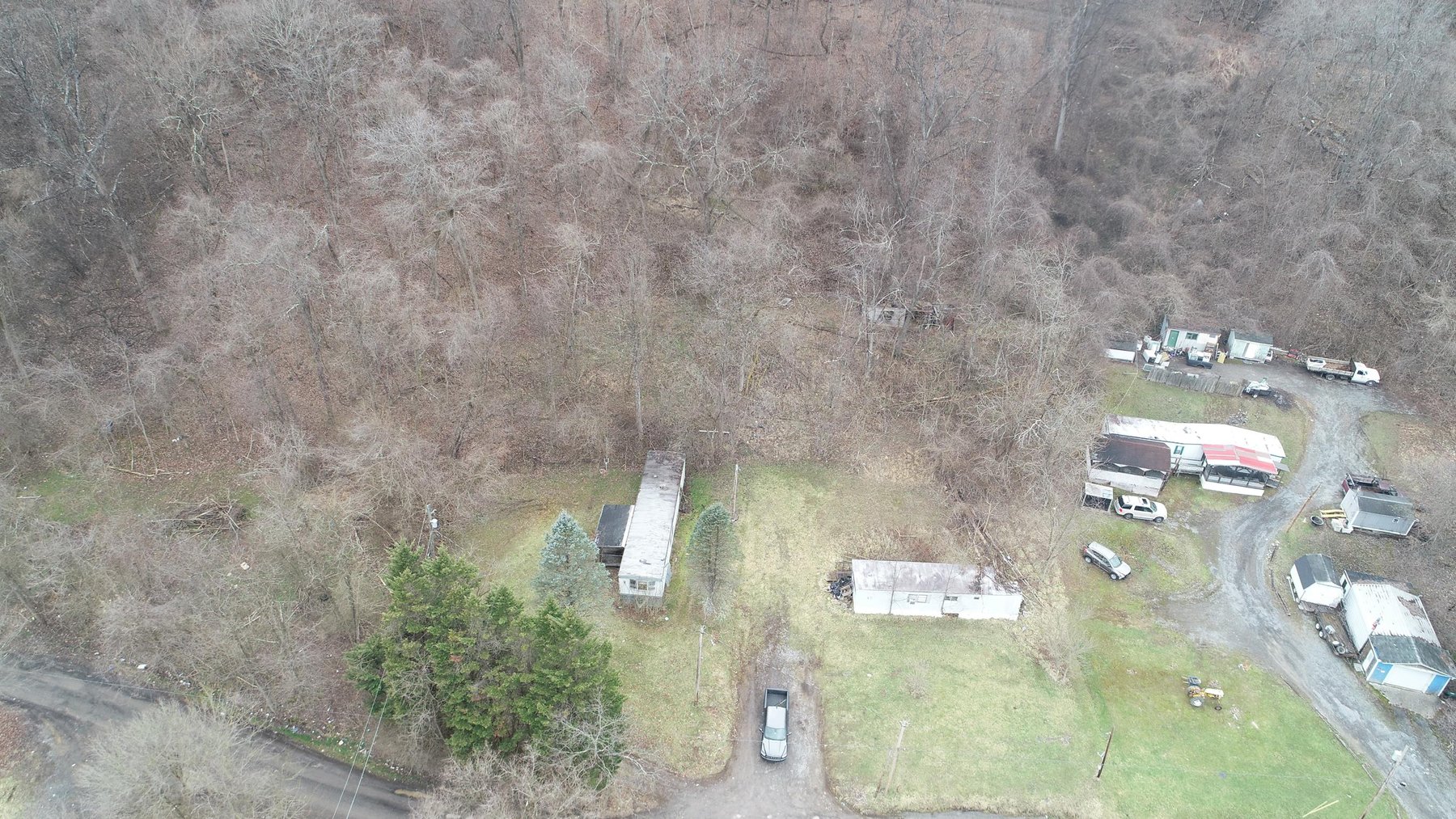Image for SOLD $61,600 - 1.71 Acres with 4 Mobile Home Spots in Morgantown Selling to the Highest Bidder
