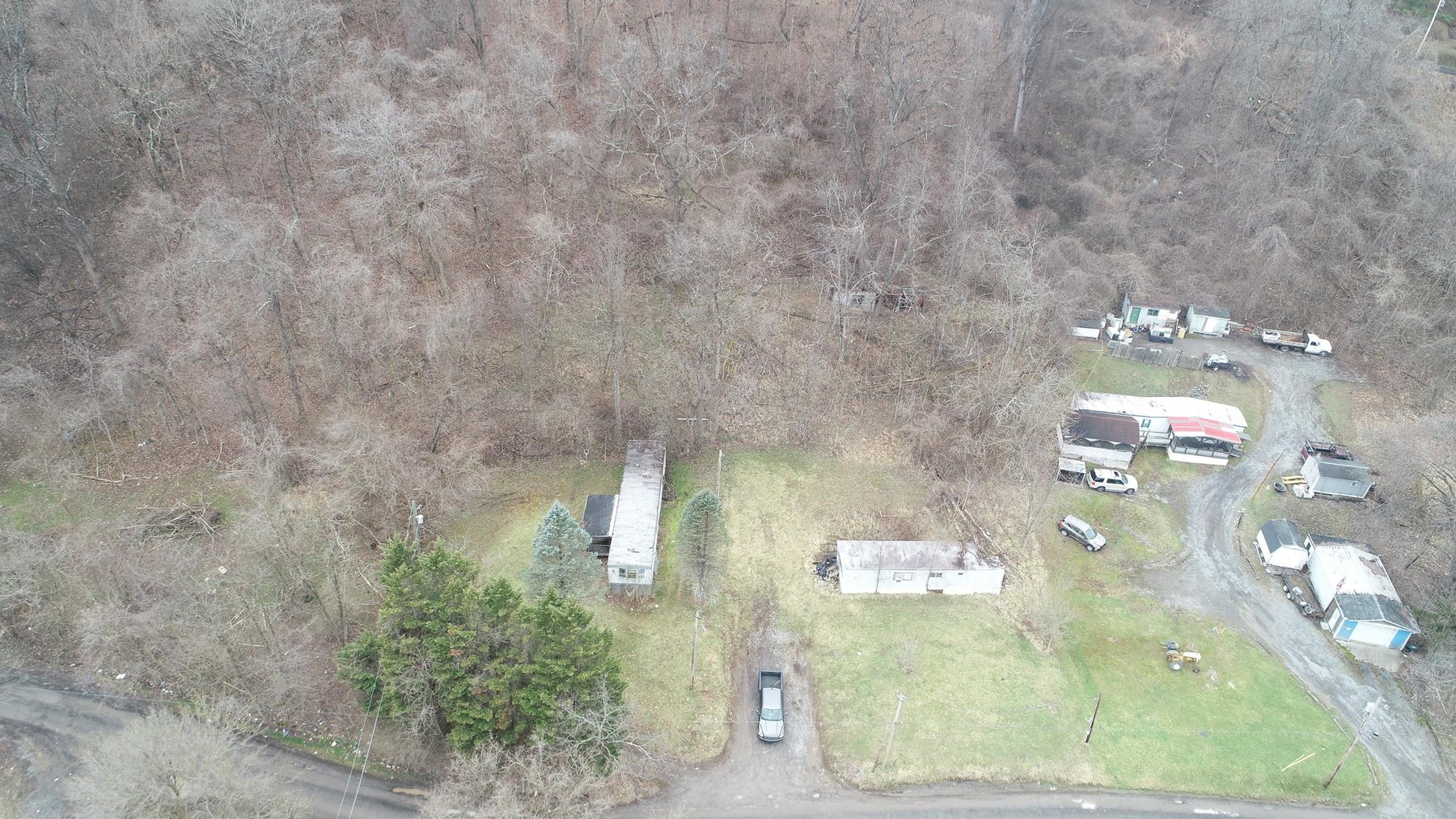 Image for SOLD $61,600 - 1.71 Acres with 4 Mobile Home Spots in Morgantown Selling to the Highest Bidder