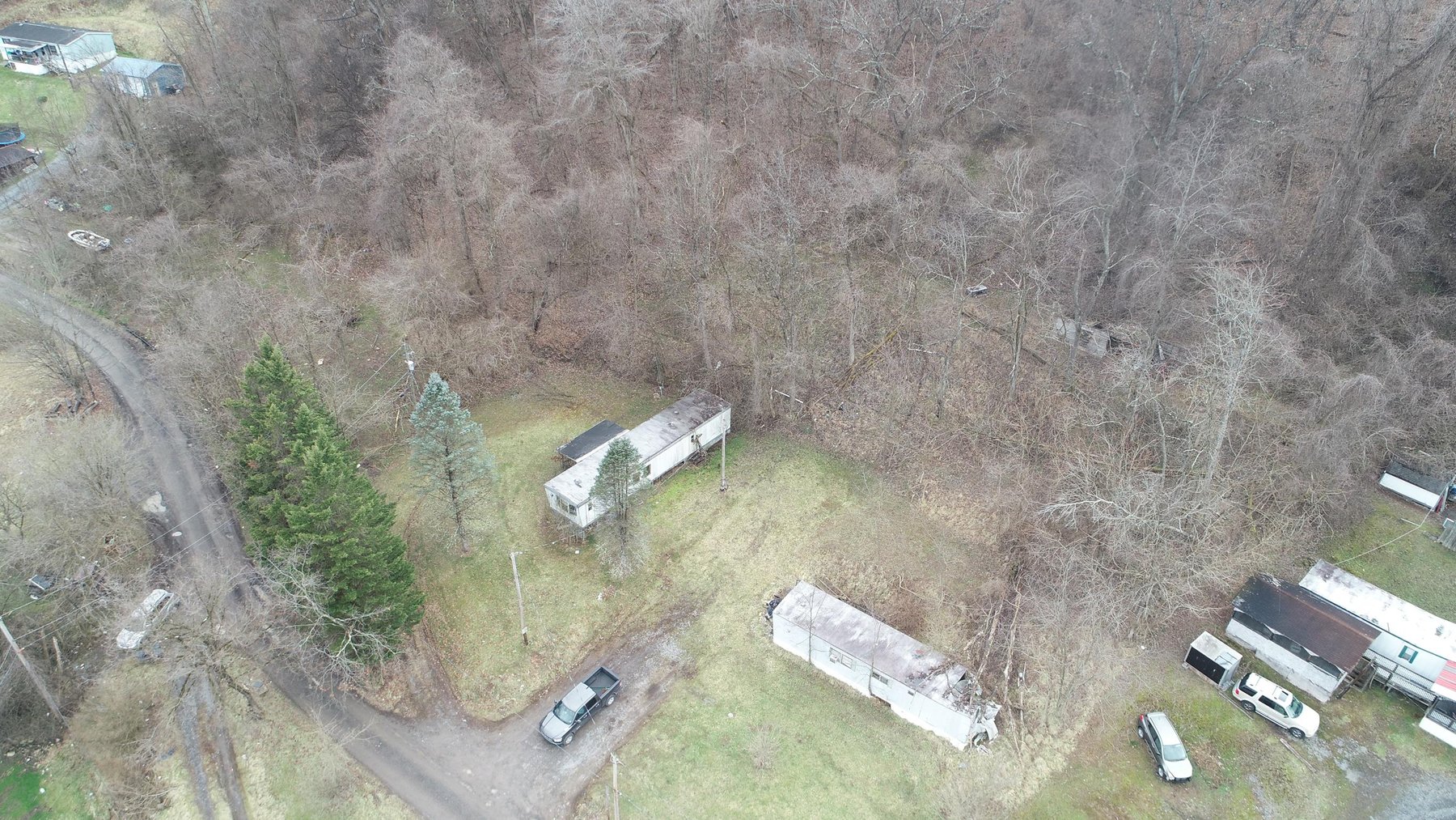 Image for SOLD $61,600 - 1.71 Acres with 4 Mobile Home Spots in Morgantown Selling to the Highest Bidder