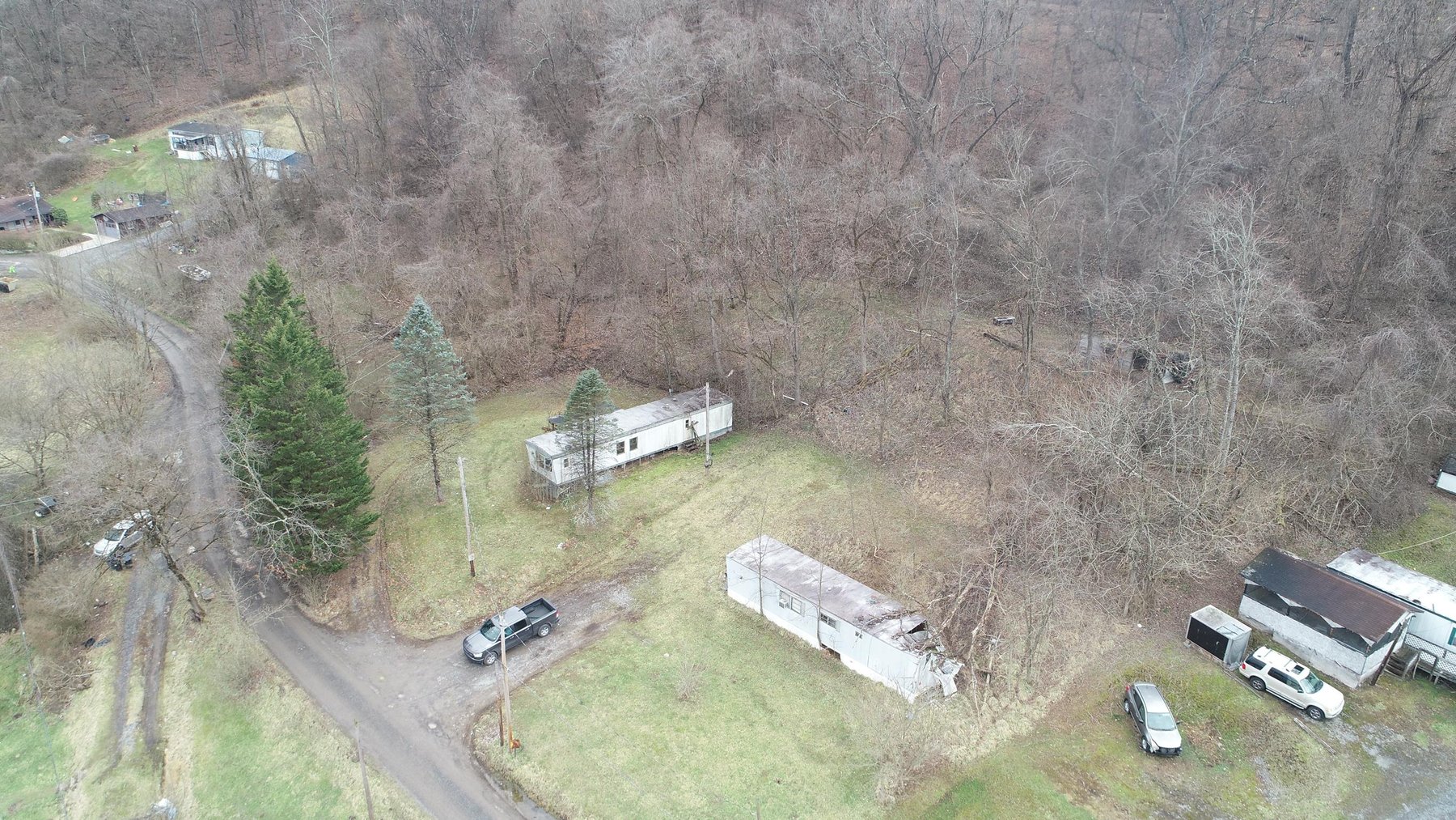 Image for SOLD $61,600 - 1.71 Acres with 4 Mobile Home Spots in Morgantown Selling to the Highest Bidder
