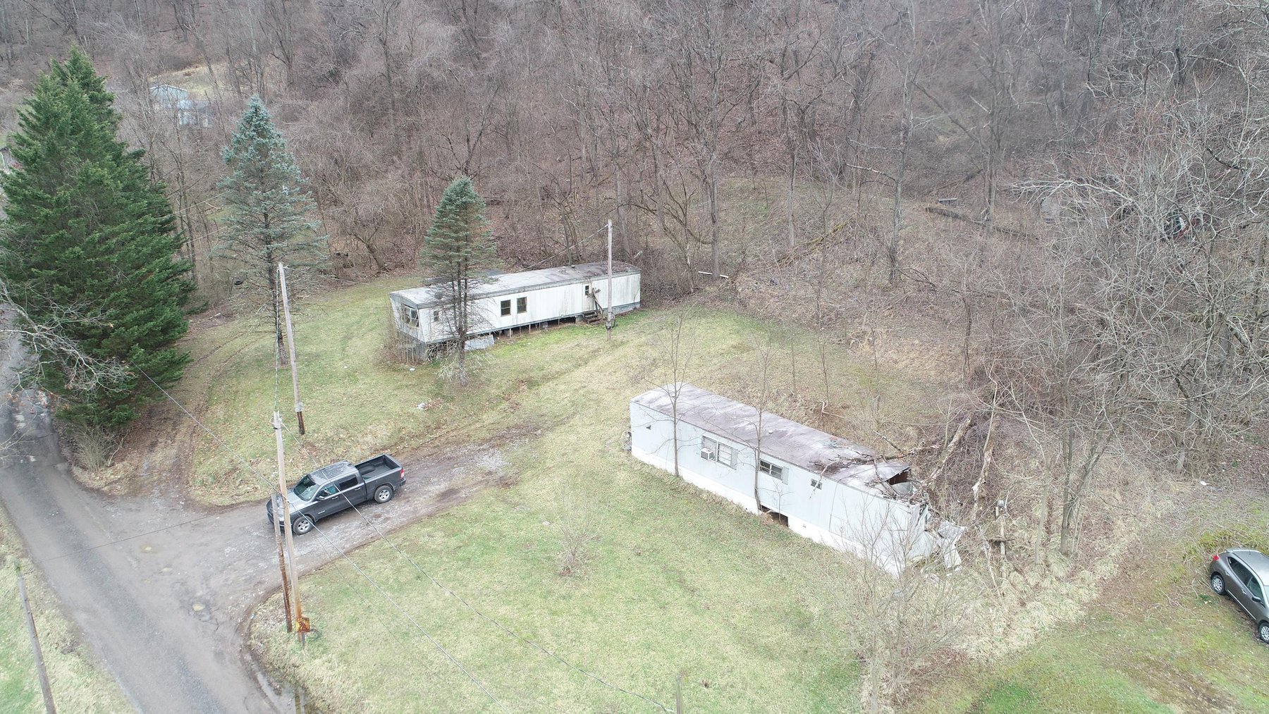 Image for SOLD $61,600 - 1.71 Acres with 4 Mobile Home Spots in Morgantown Selling to the Highest Bidder
