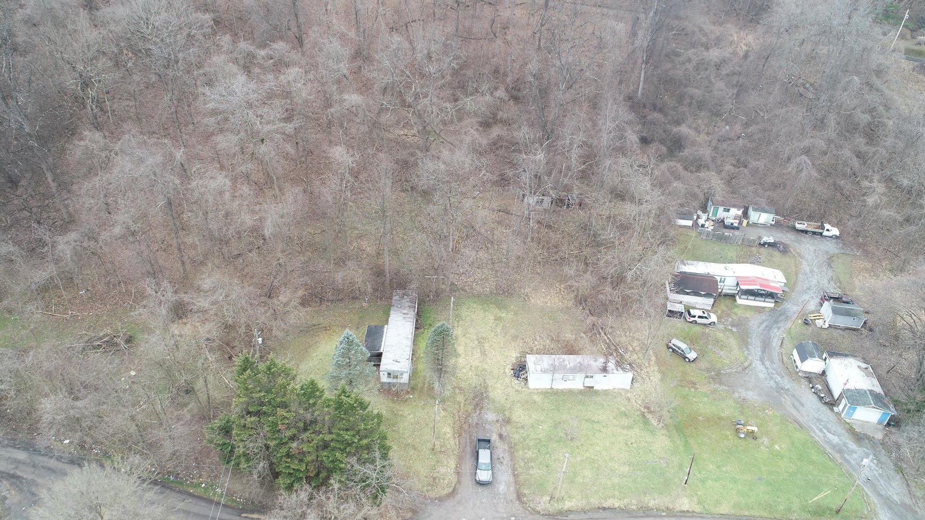 Image for SOLD $61,600 - 1.71 Acres with 4 Mobile Home Spots in Morgantown Selling to the Highest Bidder