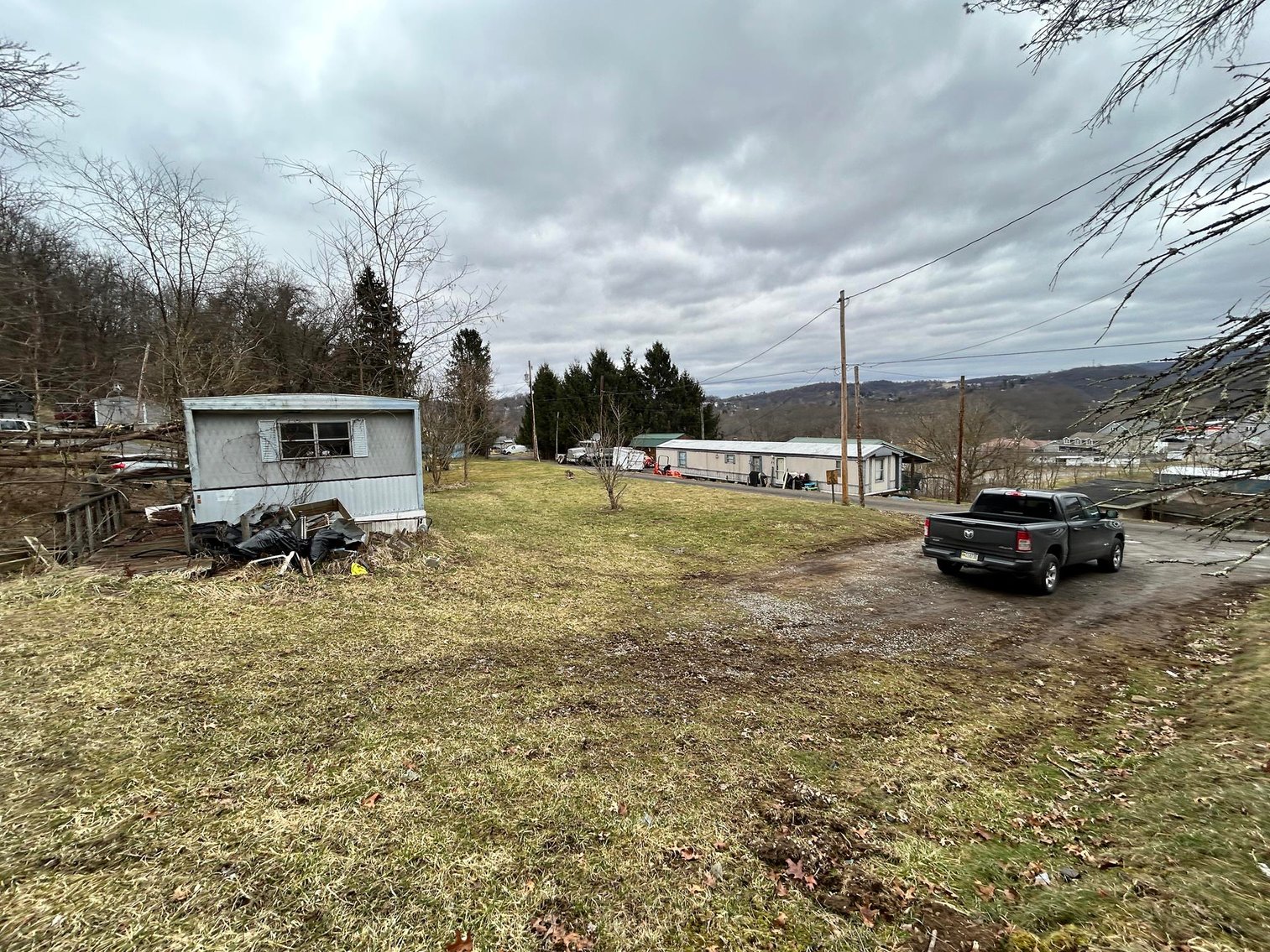 Image for SOLD $61,600 - 1.71 Acres with 4 Mobile Home Spots in Morgantown Selling to the Highest Bidder