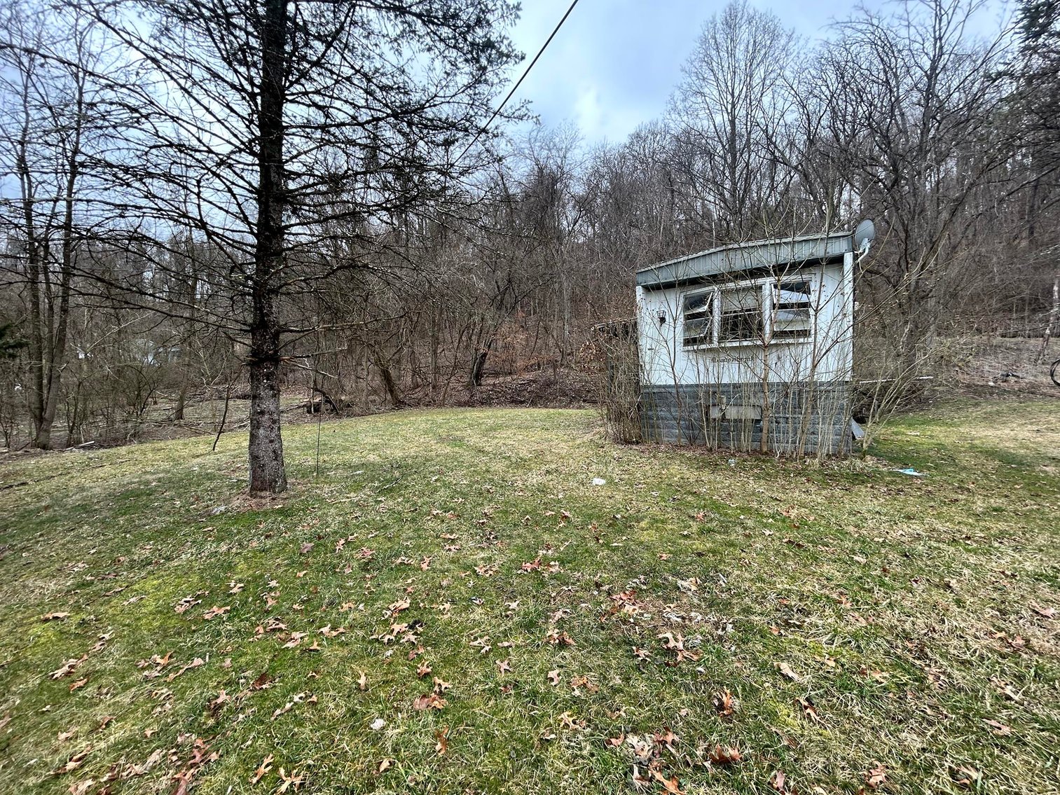 Image for SOLD $61,600 - 1.71 Acres with 4 Mobile Home Spots in Morgantown Selling to the Highest Bidder