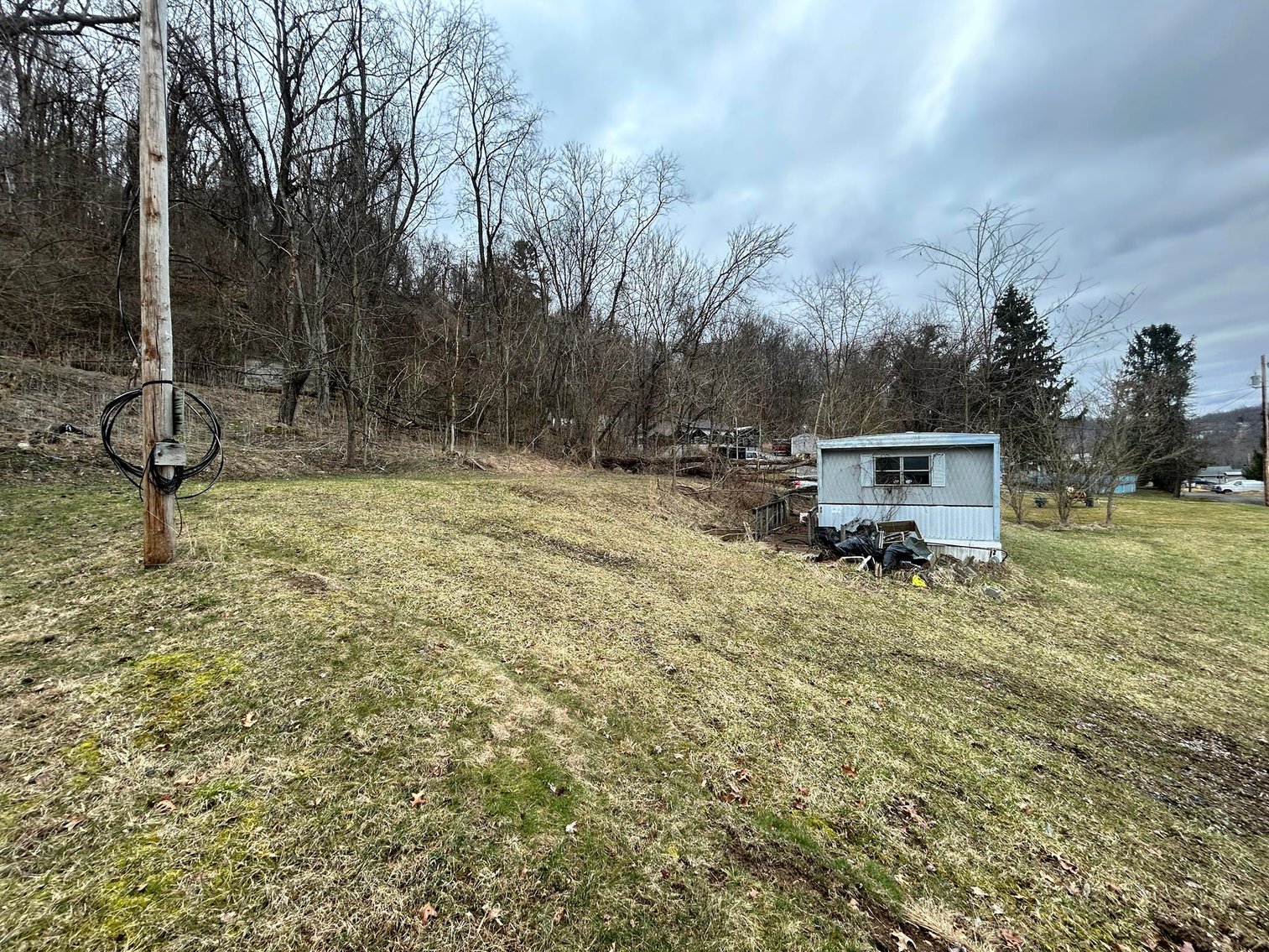 Image for SOLD $61,600 - 1.71 Acres with 4 Mobile Home Spots in Morgantown Selling to the Highest Bidder