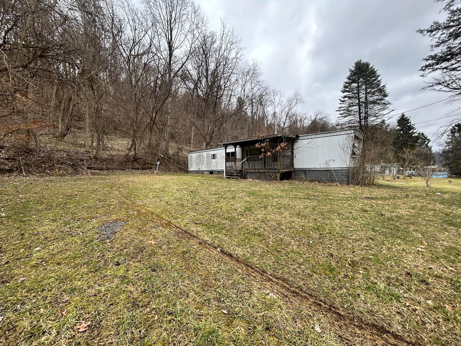 Image for SOLD $61,600 - 1.71 Acres with 4 Mobile Home Spots in Morgantown Selling to the Highest Bidder