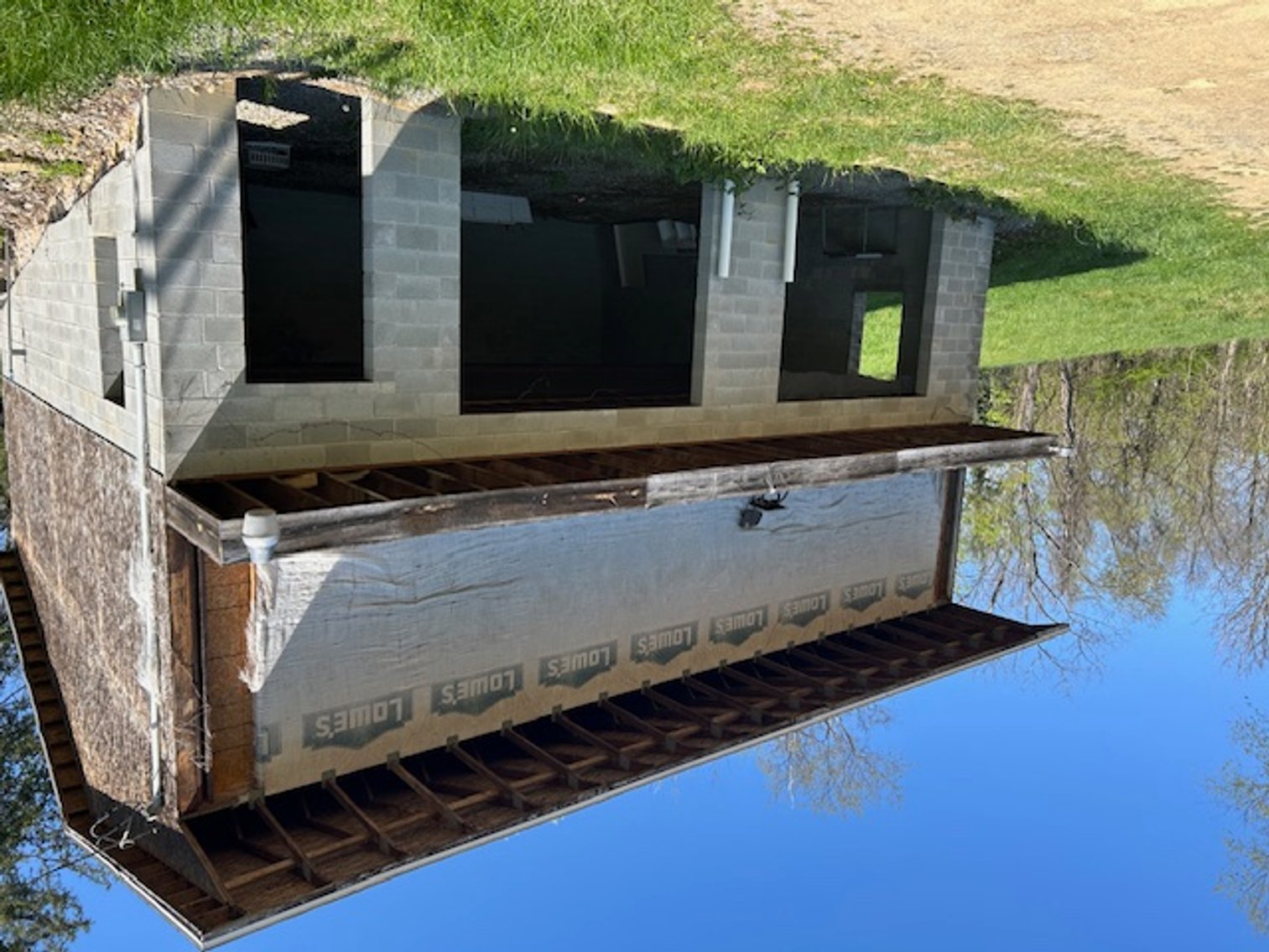 Image for SOLD $51,700 - Large Garage on 3.5 Acres with River Frontage in Fairmont