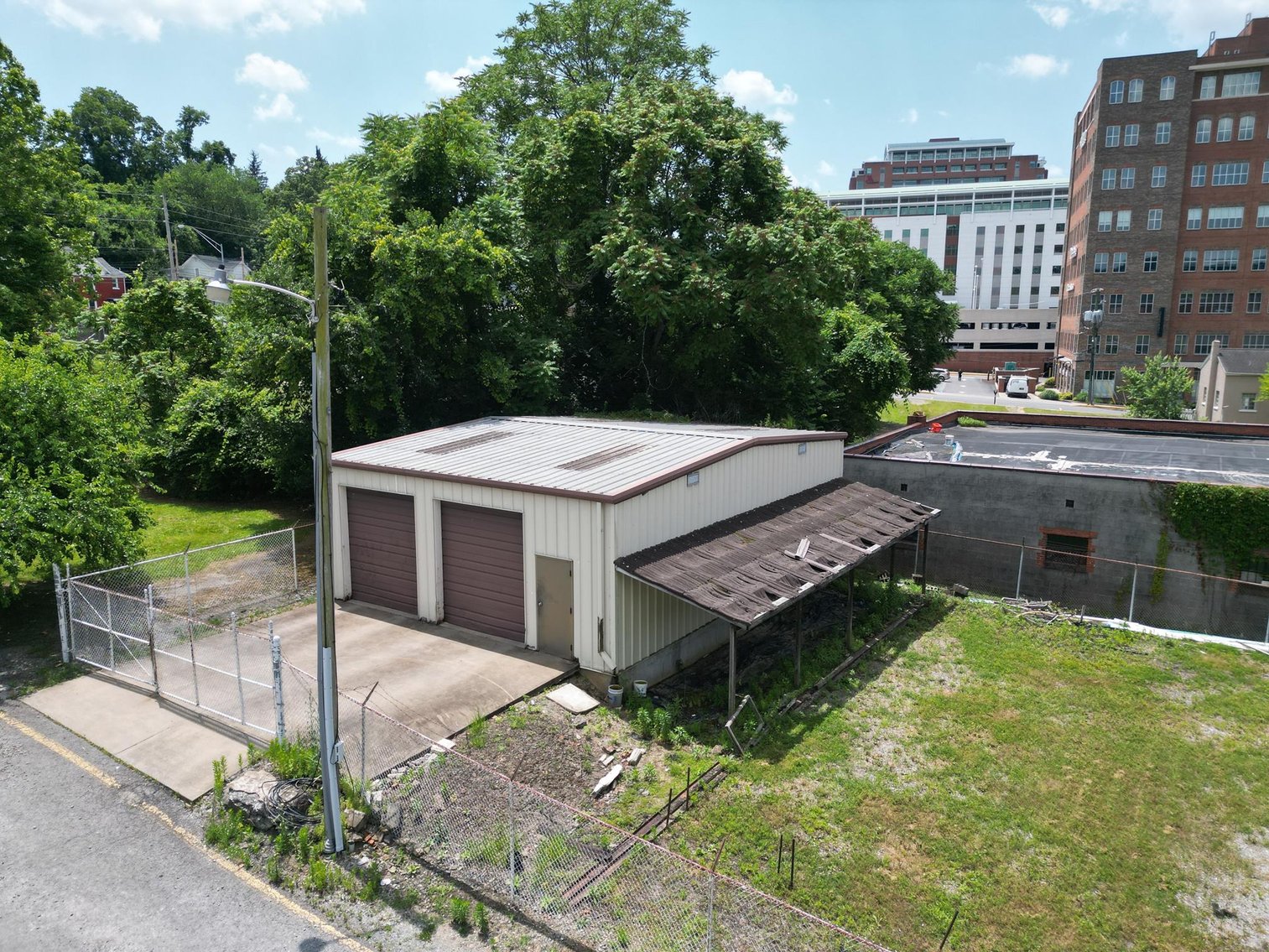 Image for SOLD $572,000 - Commercial Building & Lot in Morgantown’s Wharf District Selling to the Highest Bidder