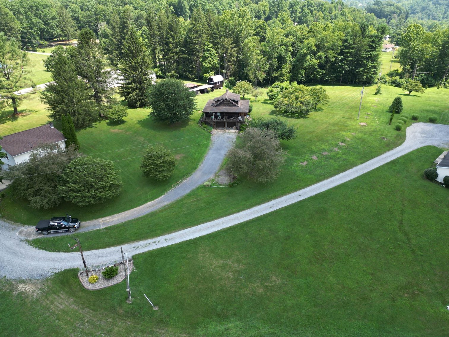 Image for SOLD $137,500 - Beautiful Log Cabin on Nearly 2 Acres in Lumberport