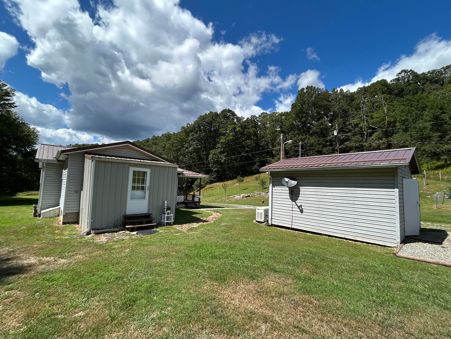Image for SOLD $170,500 - Move-in Ready Home with Garage on 32 Acres in Webster Springs Selling to the Highest Bidder