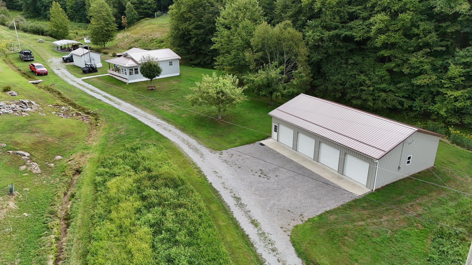 Image for SOLD $170,500 - Move-in Ready Home with Garage on 32 Acres in Webster Springs Selling to the Highest Bidder