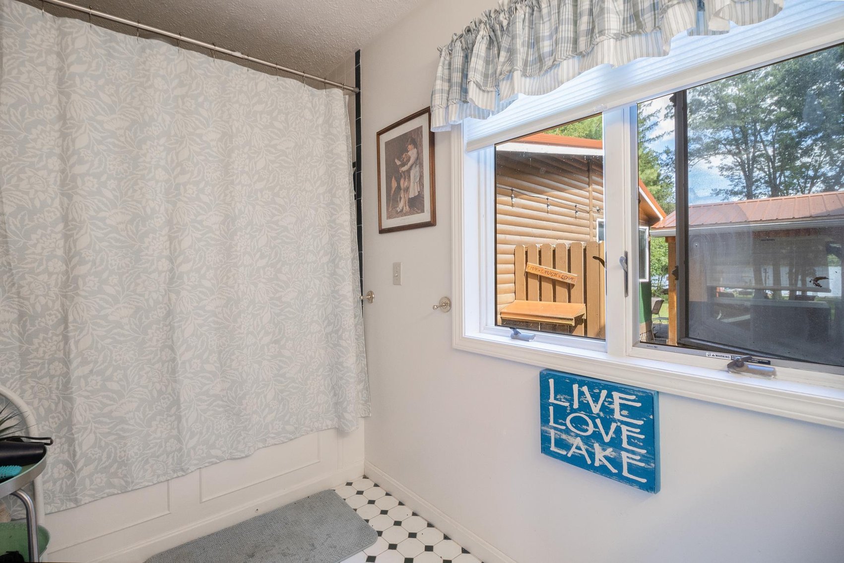 Image for SOLD $1,485,000 - Deep Creek Lakefront Home on a Spacious Lot with Flexible Zoning