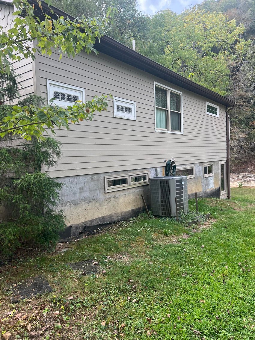 Image for SOLD $84,700 - Riverfront Home in Sutton on the Birch River