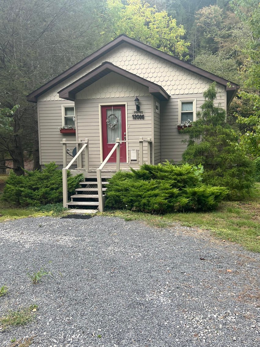 Image for SOLD $84,700 - Riverfront Home in Sutton on the Birch River