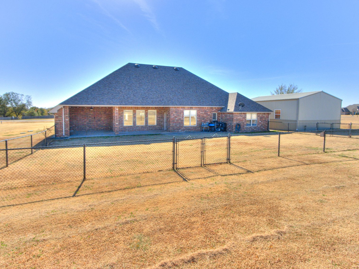 Image for 5861 Whispering Lakes Dr, Noble, OK - Beautiful Home, Shop, & Acreage