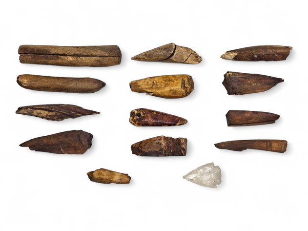 Eskimo Artifacts: A Quartz Arrowhead, Knife Handle, Fishing Weight, etc.