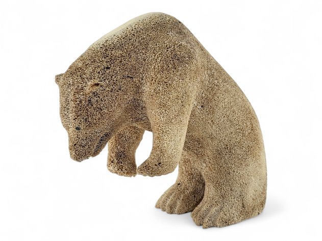 A Carved Whalebone Bear Figure - T. Oozeva