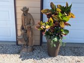 Stone Cowboy Statue With Plant