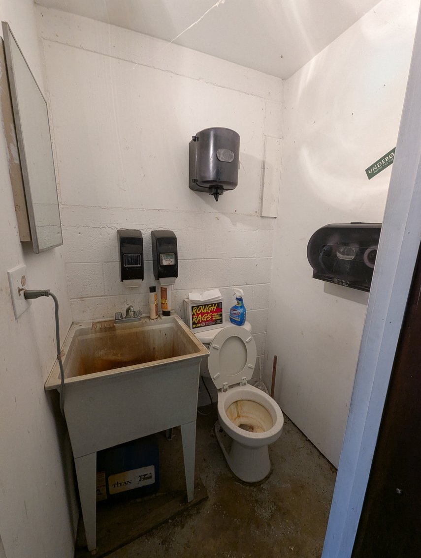 Image for 2-STORY OFFICE BLDG., 62'X40' BLOCK-FRAME SHOP, 40'X24' 3-BAY GARAGE FORMER BLEVINS HEATING & COOLING