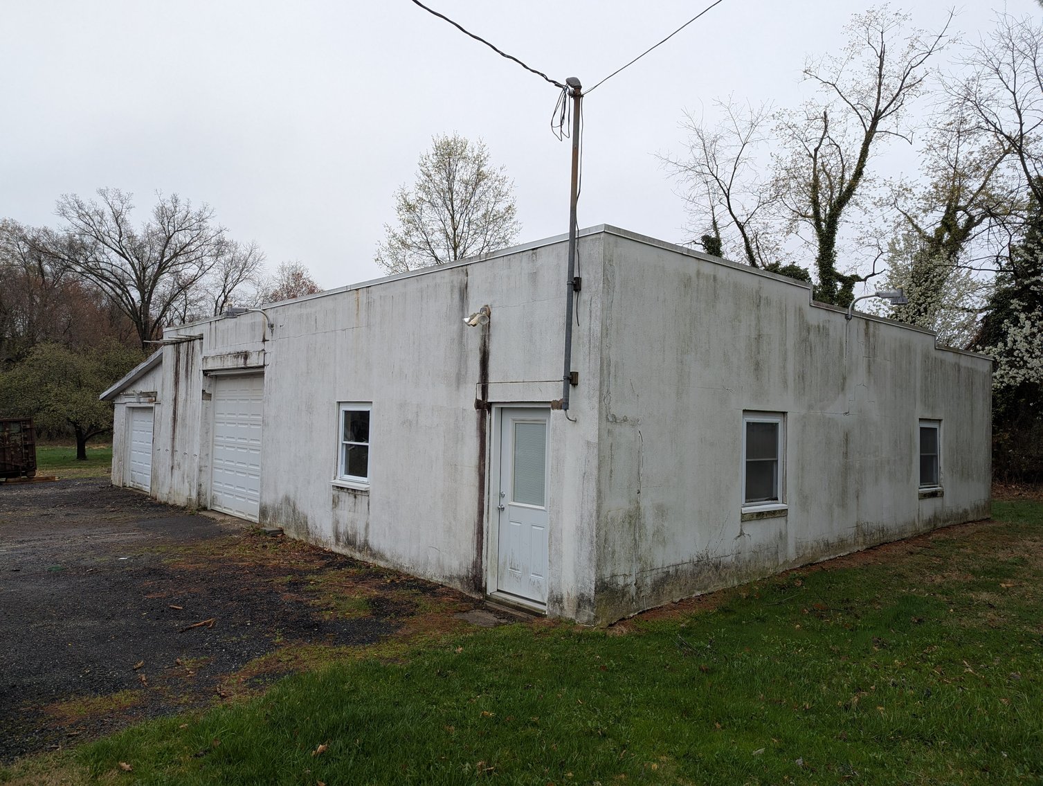 Image for 2-STORY OFFICE BLDG., 62'X40' BLOCK-FRAME SHOP, 40'X24' 3-BAY GARAGE FORMER BLEVINS HEATING & COOLING