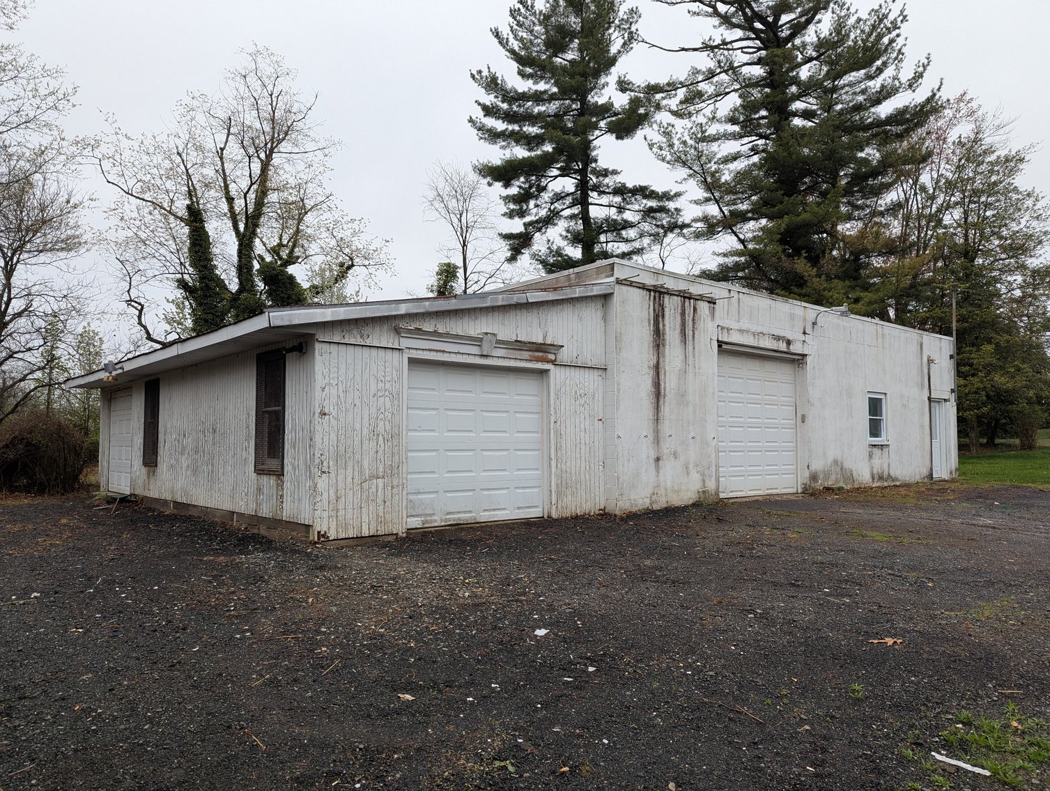 Image for 2-STORY OFFICE BLDG., 62'X40' BLOCK-FRAME SHOP, 40'X24' 3-BAY GARAGE FORMER BLEVINS HEATING & COOLING