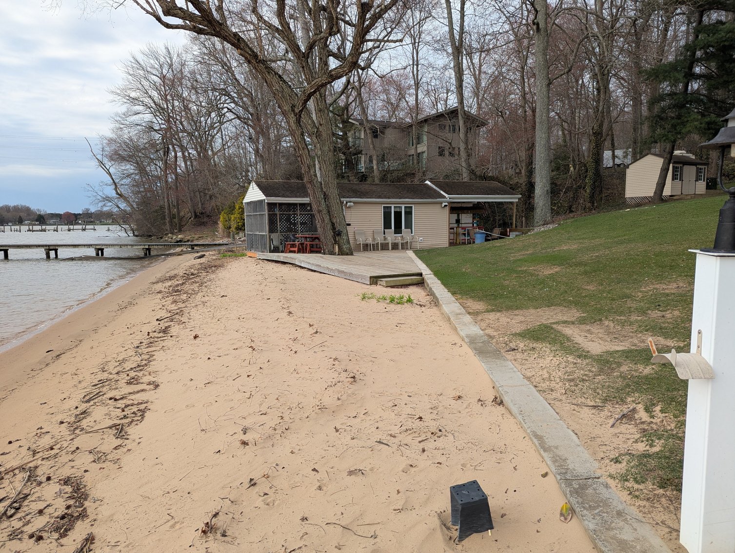 Image for LARGE WATERFRONT PROPERTY/ 2-STORY CONTEMP. HOME W/ ATT. 2-CAR GARAGE & 1-BR COTTAGE HOME/(4) PARCELS TOTALING 3.35 +/- AC SOLD IN THE ENTIRETY/ 155' FT FRONTAGE ON BUSH RIVER W SANDY BEACH/ LARGE DOCK W/ (10) +/- BOAT SLIPS, TIKI BAR & MORE!