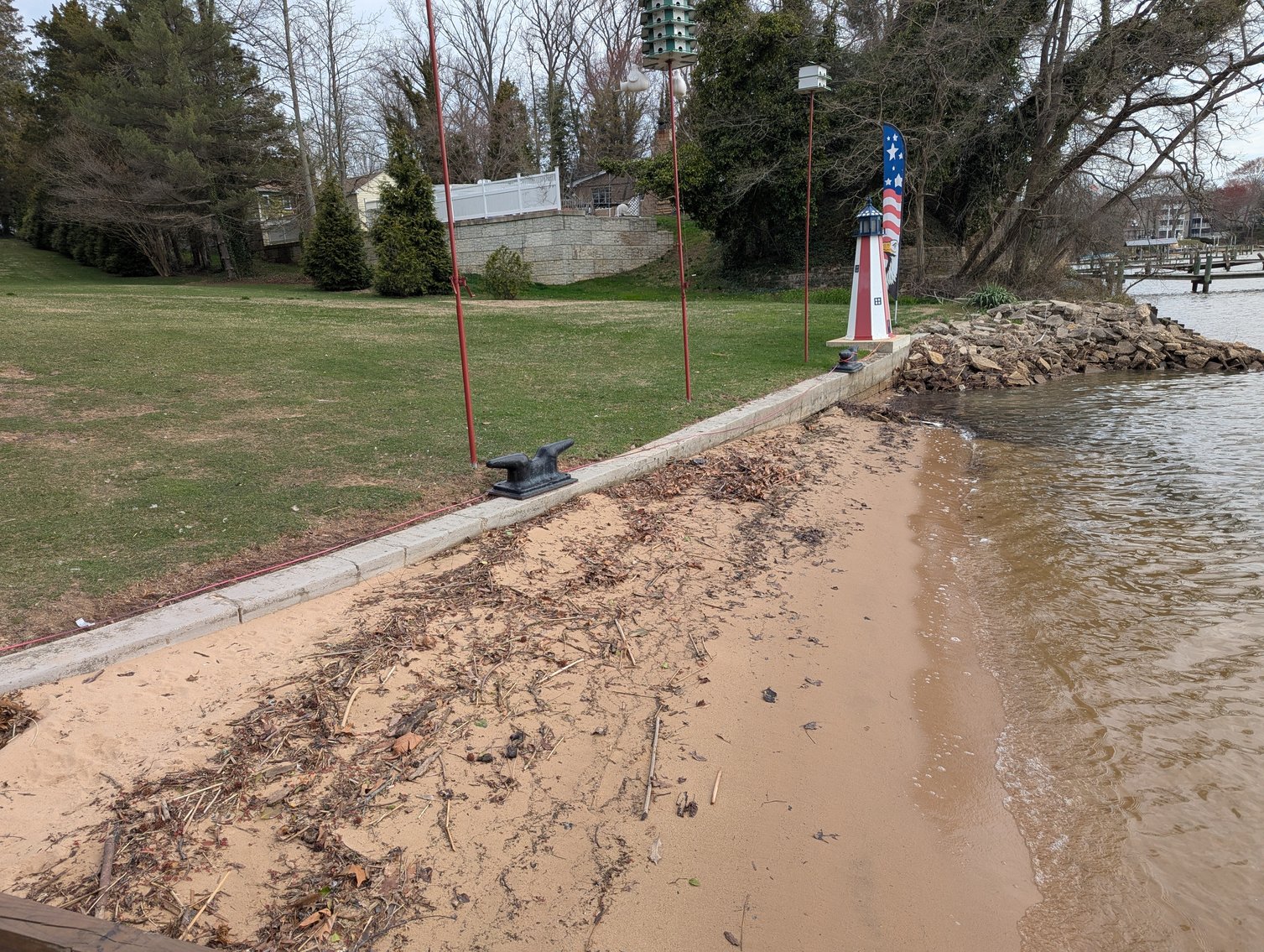 Image for LARGE WATERFRONT PROPERTY/ 2-STORY CONTEMP. HOME W/ ATT. 2-CAR GARAGE & 1-BR COTTAGE HOME/(4) PARCELS TOTALING 3.35 +/- AC SOLD IN THE ENTIRETY/ 155' FT FRONTAGE ON BUSH RIVER W SANDY BEACH/ LARGE DOCK W/ (10) +/- BOAT SLIPS, TIKI BAR & MORE!