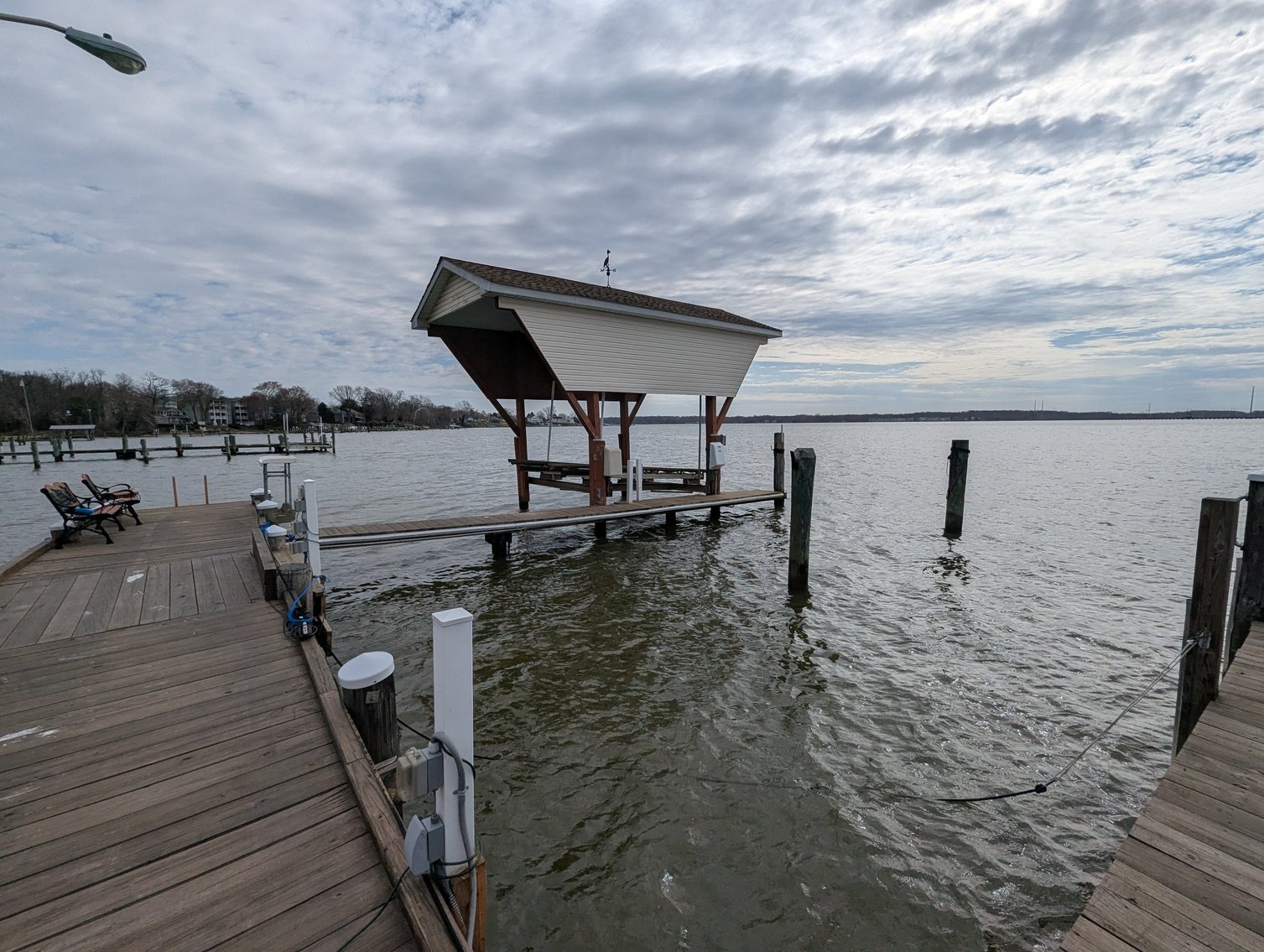 Image for LARGE WATERFRONT PROPERTY/ 2-STORY CONTEMP. HOME W/ ATT. 2-CAR GARAGE & 1-BR COTTAGE HOME/(4) PARCELS TOTALING 3.35 +/- AC SOLD IN THE ENTIRETY/ 155' FT FRONTAGE ON BUSH RIVER W SANDY BEACH/ LARGE DOCK W/ (10) +/- BOAT SLIPS, TIKI BAR & MORE!