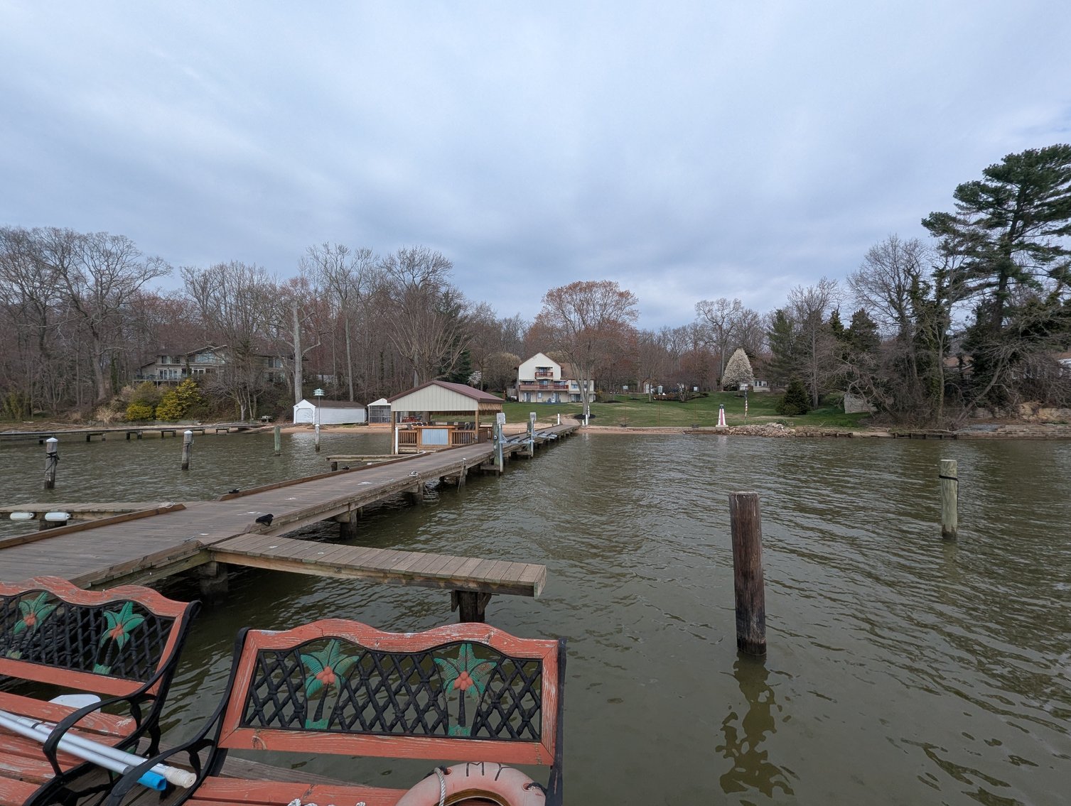 Image for LARGE WATERFRONT PROPERTY/ 2-STORY CONTEMP. HOME W/ ATT. 2-CAR GARAGE & 1-BR COTTAGE HOME/(4) PARCELS TOTALING 3.35 +/- AC SOLD IN THE ENTIRETY/ 155' FT FRONTAGE ON BUSH RIVER W SANDY BEACH/ LARGE DOCK W/ (10) +/- BOAT SLIPS, TIKI BAR & MORE!
