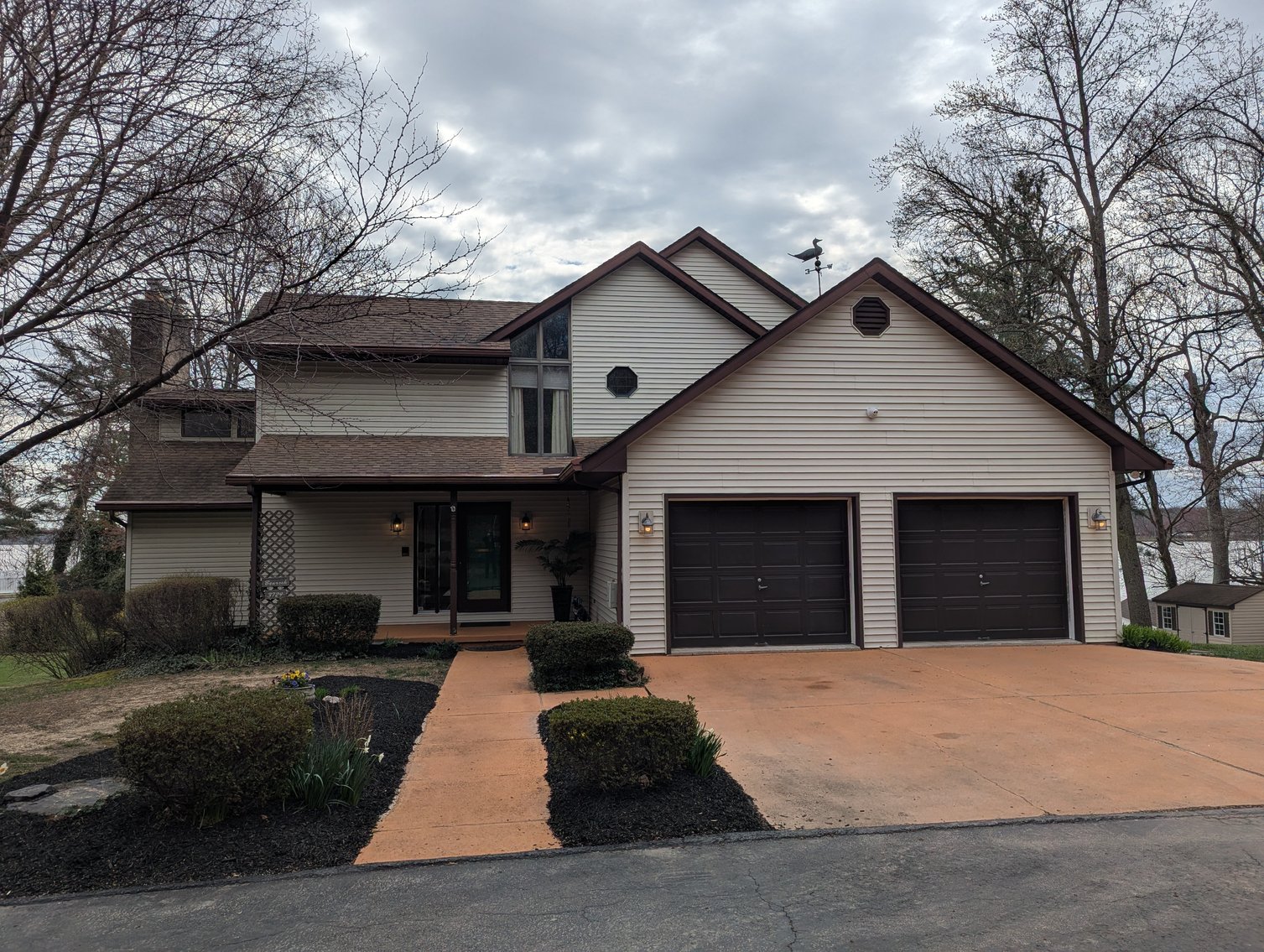 Image for LARGE WATERFRONT PROPERTY/ 2-STORY CONTEMP. HOME W/ ATT. 2-CAR GARAGE & 1-BR COTTAGE HOME/(4) PARCELS TOTALING 3.35 +/- AC SOLD IN THE ENTIRETY/ 155' FT FRONTAGE ON BUSH RIVER W SANDY BEACH/ LARGE DOCK W/ (10) +/- BOAT SLIPS, TIKI BAR & MORE!