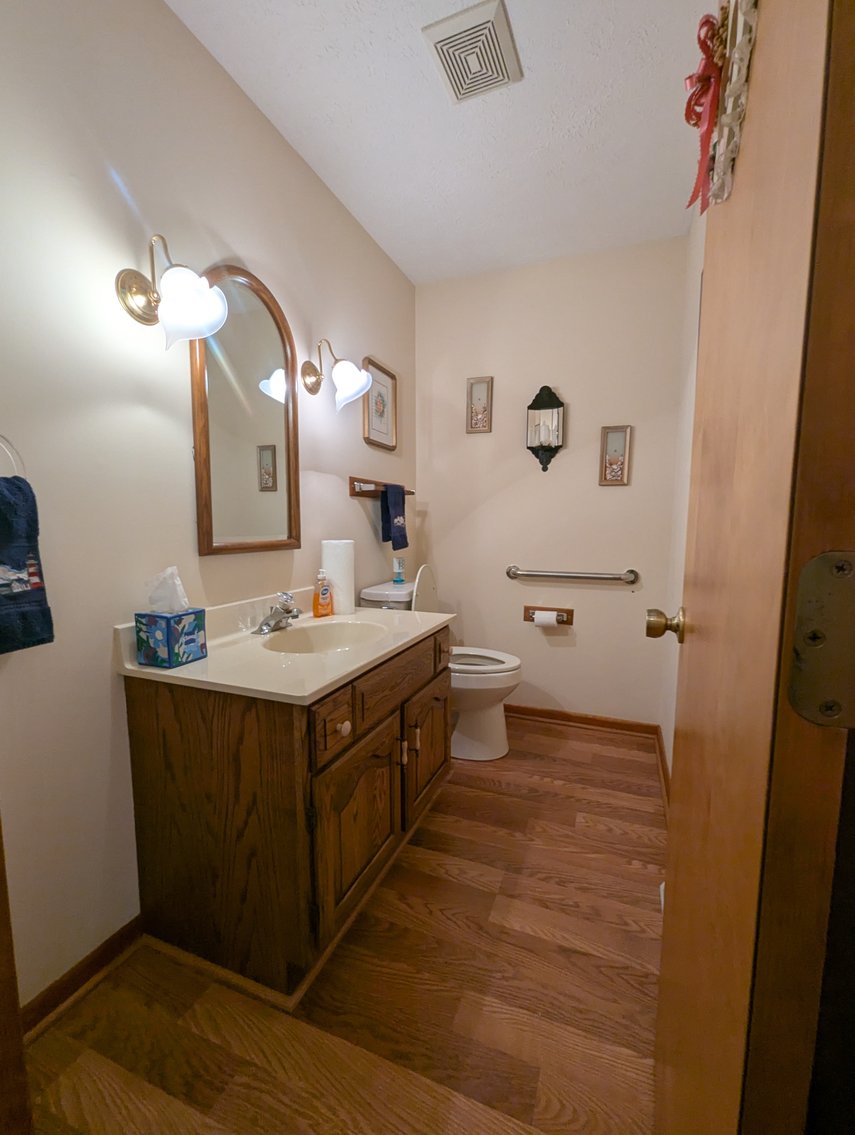 Image for LARGE WATERFRONT PROPERTY/ 2-STORY CONTEMP. HOME W/ ATT. 2-CAR GARAGE & 1-BR COTTAGE HOME/(4) PARCELS TOTALING 3.35 +/- AC SOLD IN THE ENTIRETY/ 155' FT FRONTAGE ON BUSH RIVER W SANDY BEACH/ LARGE DOCK W/ (10) +/- BOAT SLIPS, TIKI BAR & MORE!