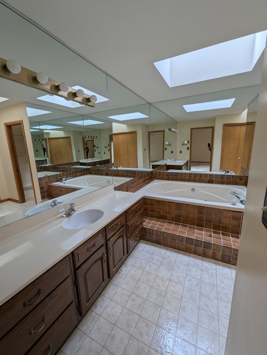 Image for LARGE WATERFRONT PROPERTY/ 2-STORY CONTEMP. HOME W/ ATT. 2-CAR GARAGE & 1-BR COTTAGE HOME/(4) PARCELS TOTALING 3.35 +/- AC SOLD IN THE ENTIRETY/ 155' FT FRONTAGE ON BUSH RIVER W SANDY BEACH/ LARGE DOCK W/ (10) +/- BOAT SLIPS, TIKI BAR & MORE!