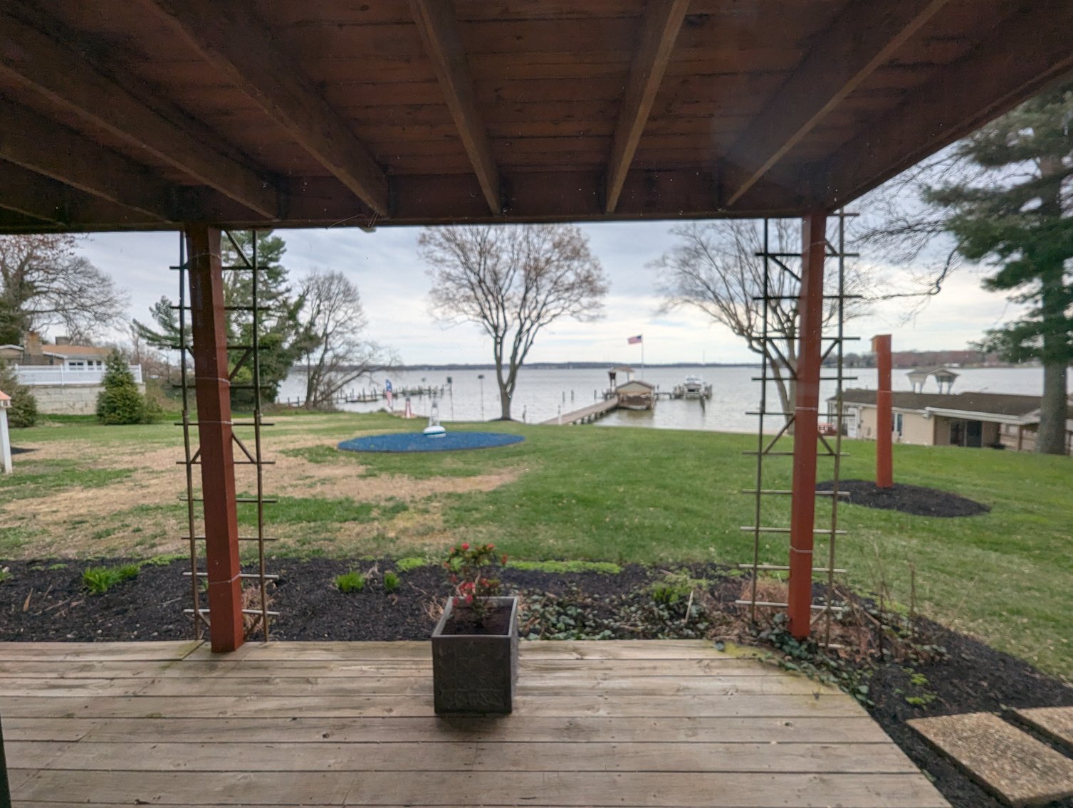 Image for LARGE WATERFRONT PROPERTY/ 2-STORY CONTEMP. HOME W/ ATT. 2-CAR GARAGE & 1-BR COTTAGE HOME/(4) PARCELS TOTALING 3.35 +/- AC SOLD IN THE ENTIRETY/ 155' FT FRONTAGE ON BUSH RIVER W SANDY BEACH/ LARGE DOCK W/ (10) +/- BOAT SLIPS, TIKI BAR & MORE!