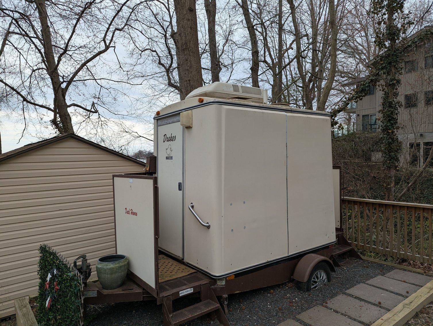 Image for LARGE WATERFRONT PROPERTY/ 2-STORY CONTEMP. HOME W/ ATT. 2-CAR GARAGE & 1-BR COTTAGE HOME/(4) PARCELS TOTALING 3.35 +/- AC SOLD IN THE ENTIRETY/ 155' FT FRONTAGE ON BUSH RIVER W SANDY BEACH/ LARGE DOCK W/ (10) +/- BOAT SLIPS, TIKI BAR & MORE!