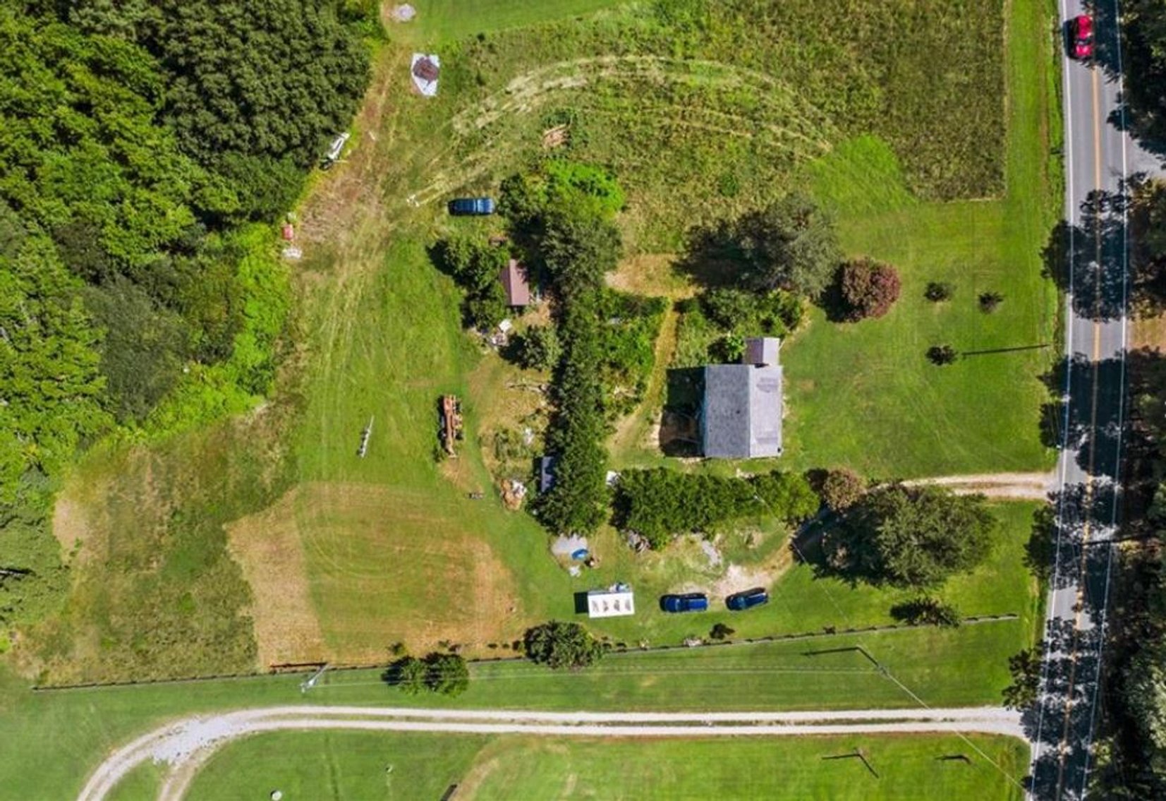 Image for Partially Renovated House on 3.06 acres with an additional 2.1 acre Buildable lot.
