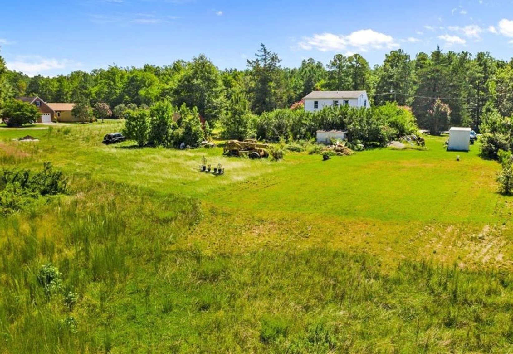 Image for Partially Renovated House on 3.06 acres with an additional 2.1 acre Buildable lot.