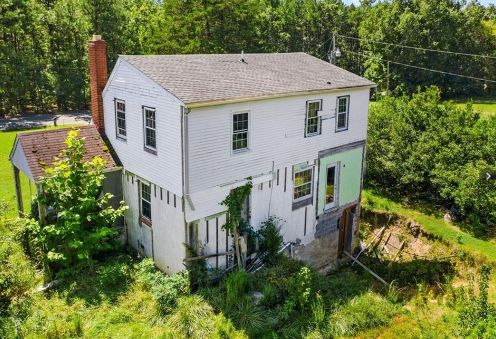 Image for Partially Renovated House on 3.06 acres with an additional 2.1 acre Buildable lot.