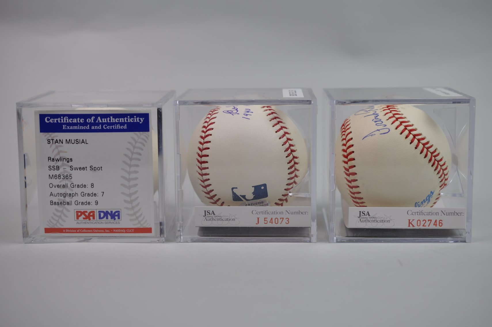 Baseballs Signed by Robinson, Feller, & Musial