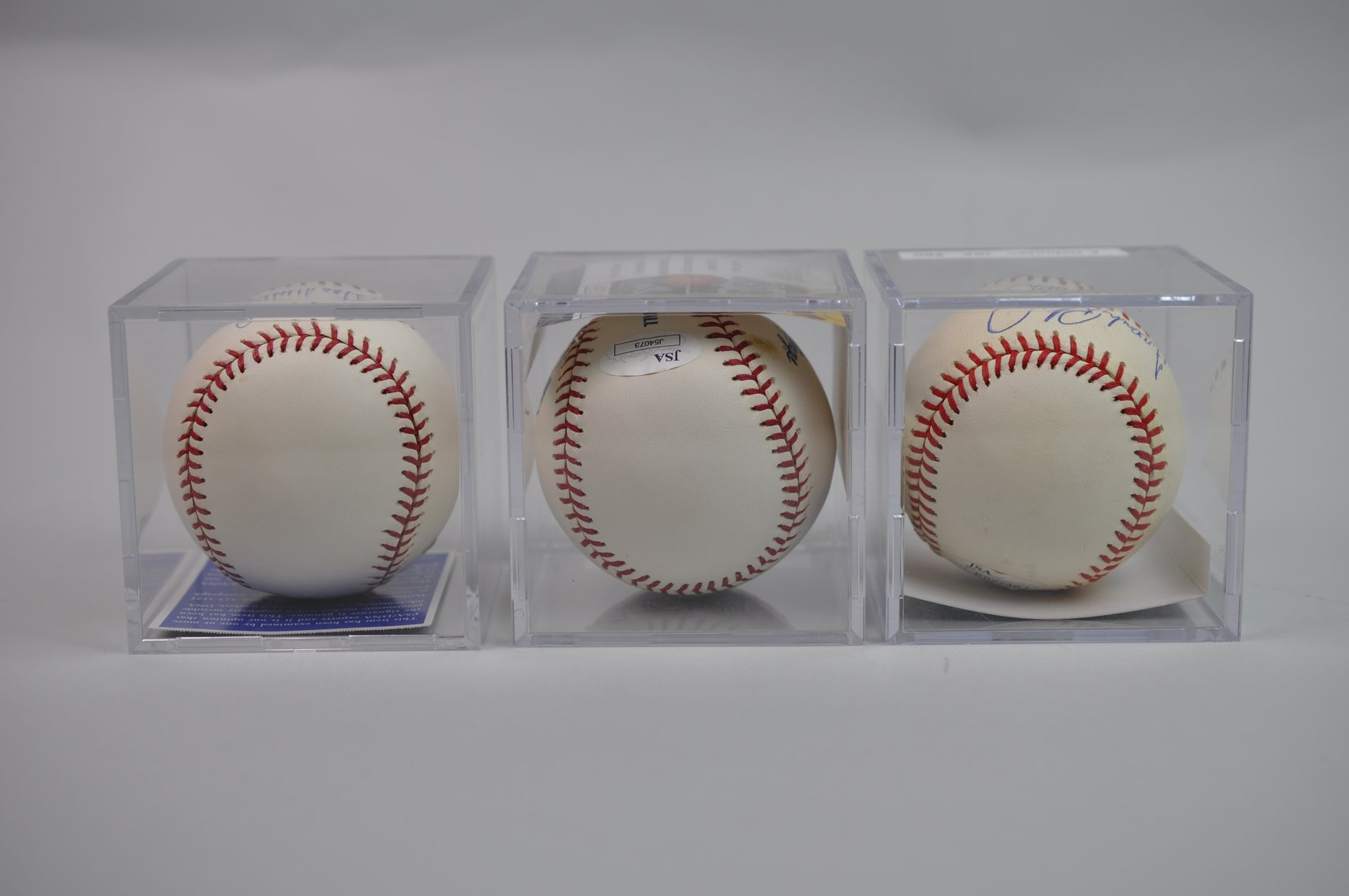 Baseballs Signed by Robinson, Feller, & Musial