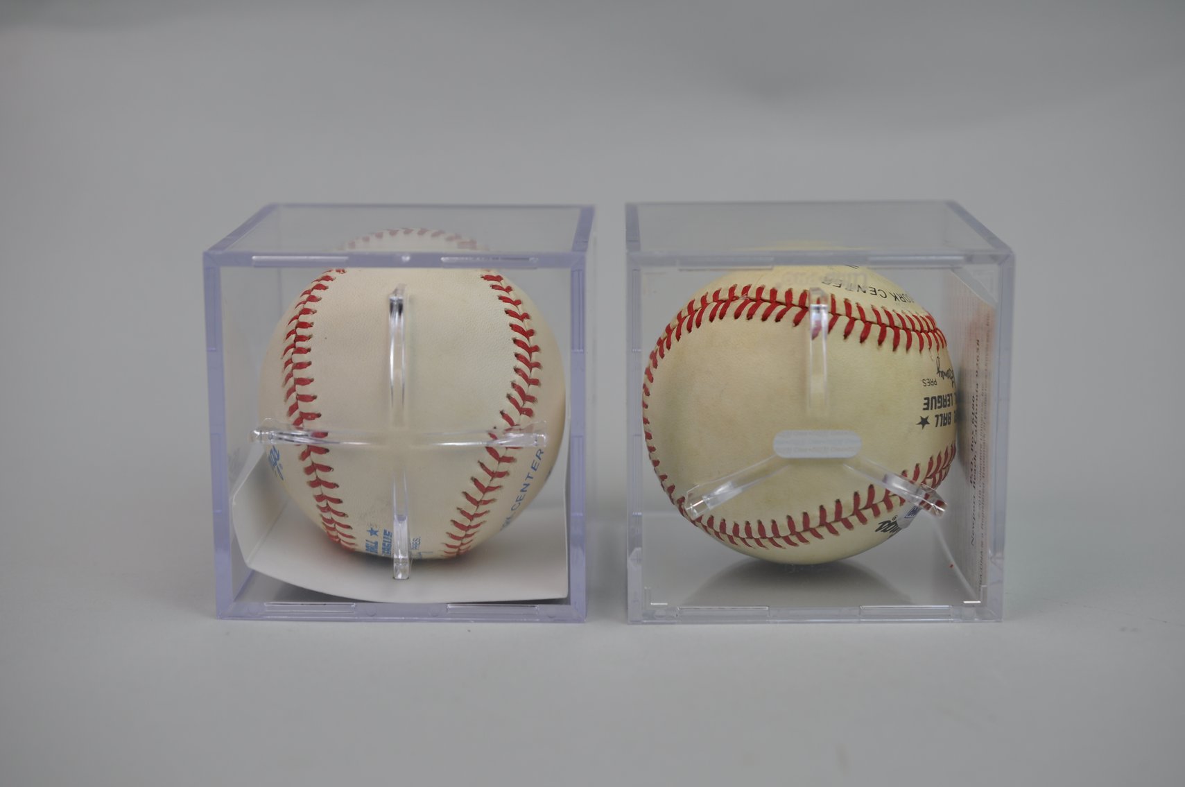 Nolan Ryan & Julio Rodríguez Signed Balls