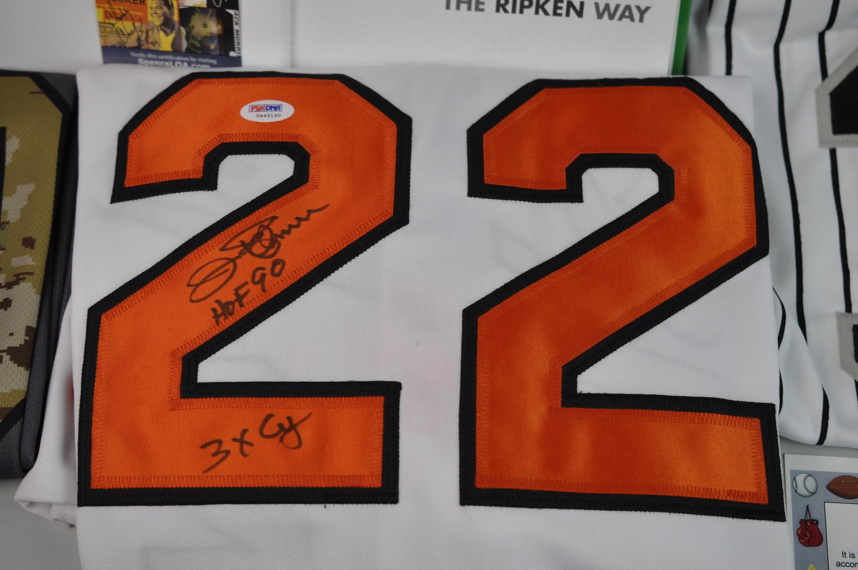 Autographed HOF Jerseys & Signed Ripken Book