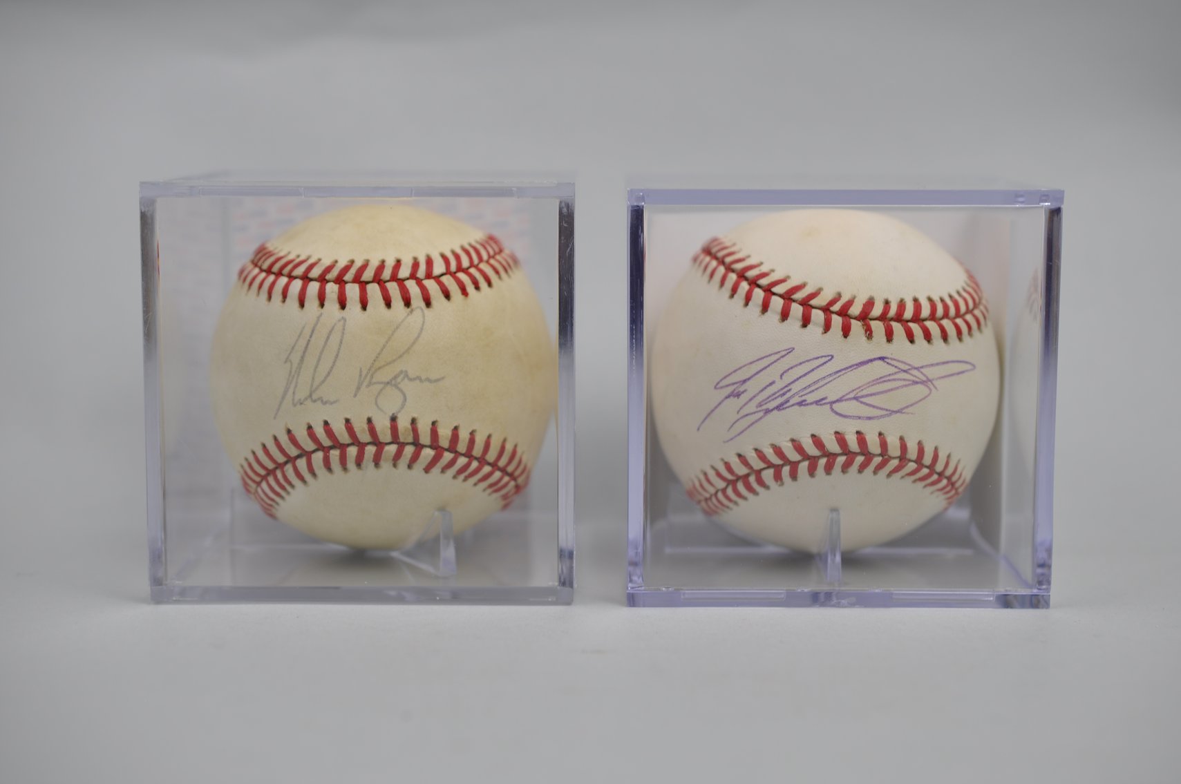 Nolan Ryan & Julio Rodríguez Signed Balls