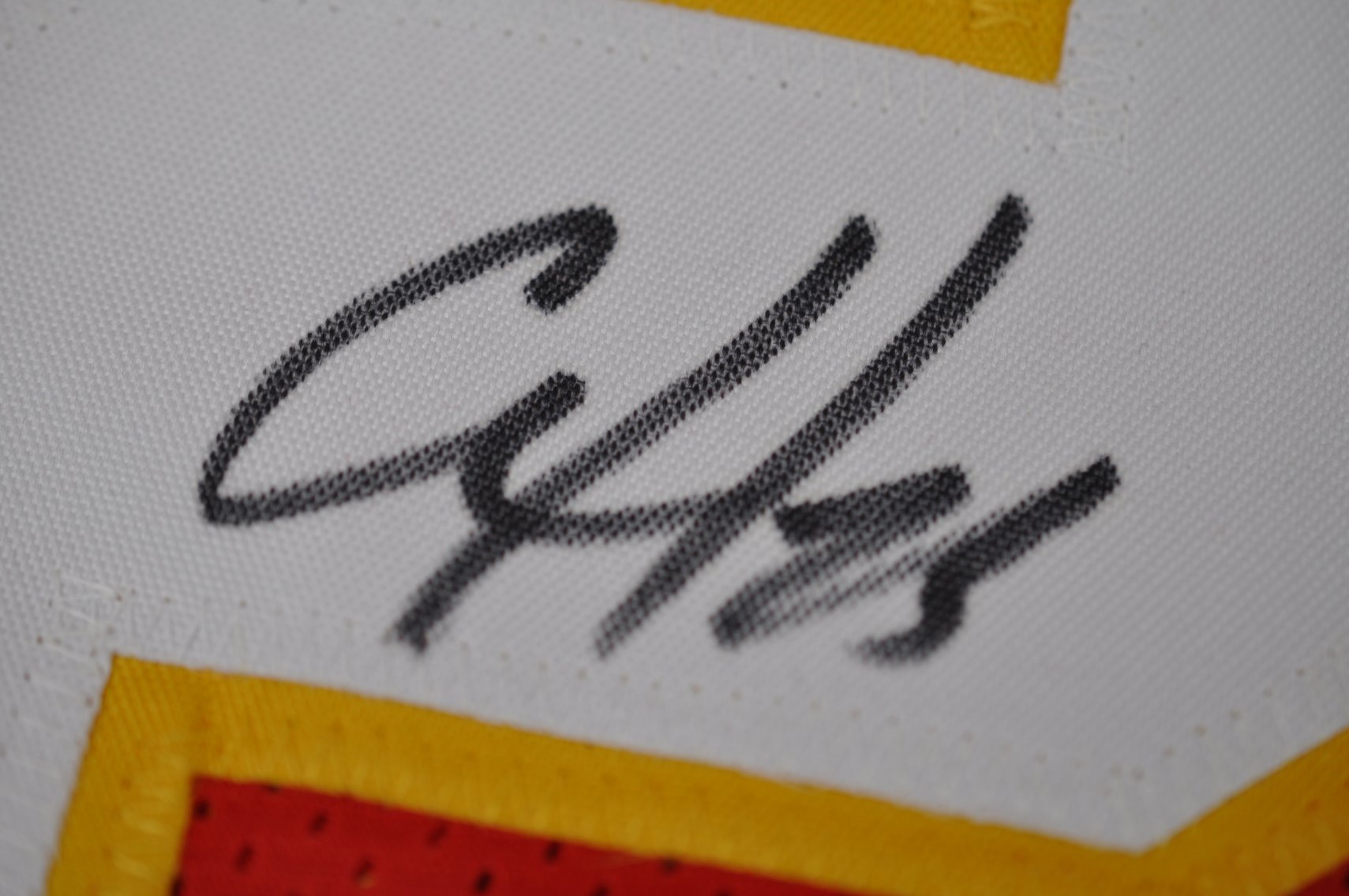 Moon & Edwards-Helaire Signed Football Jerseys